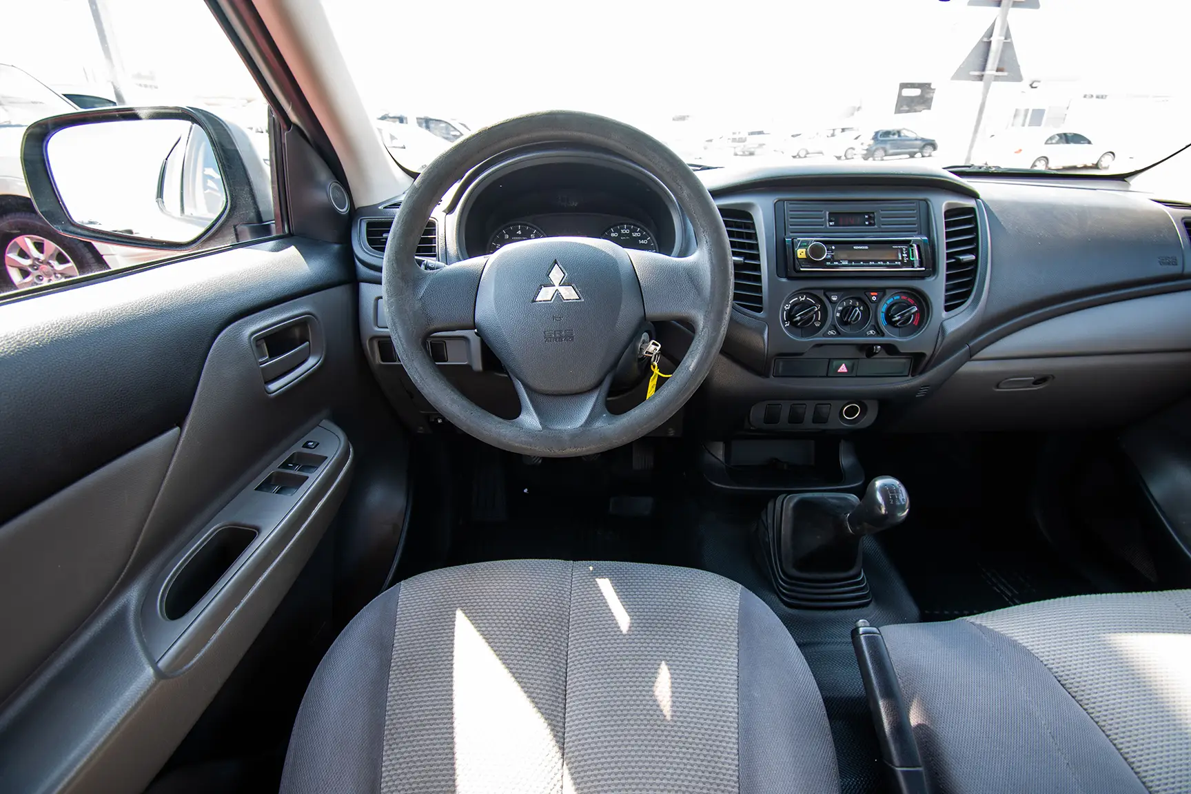 Used 2016 Mitsubishi L200 GL Double Cabin in White – Steering Wheel & Instrument Cluster for Sale at First Choice Cars Dubai Sharjah