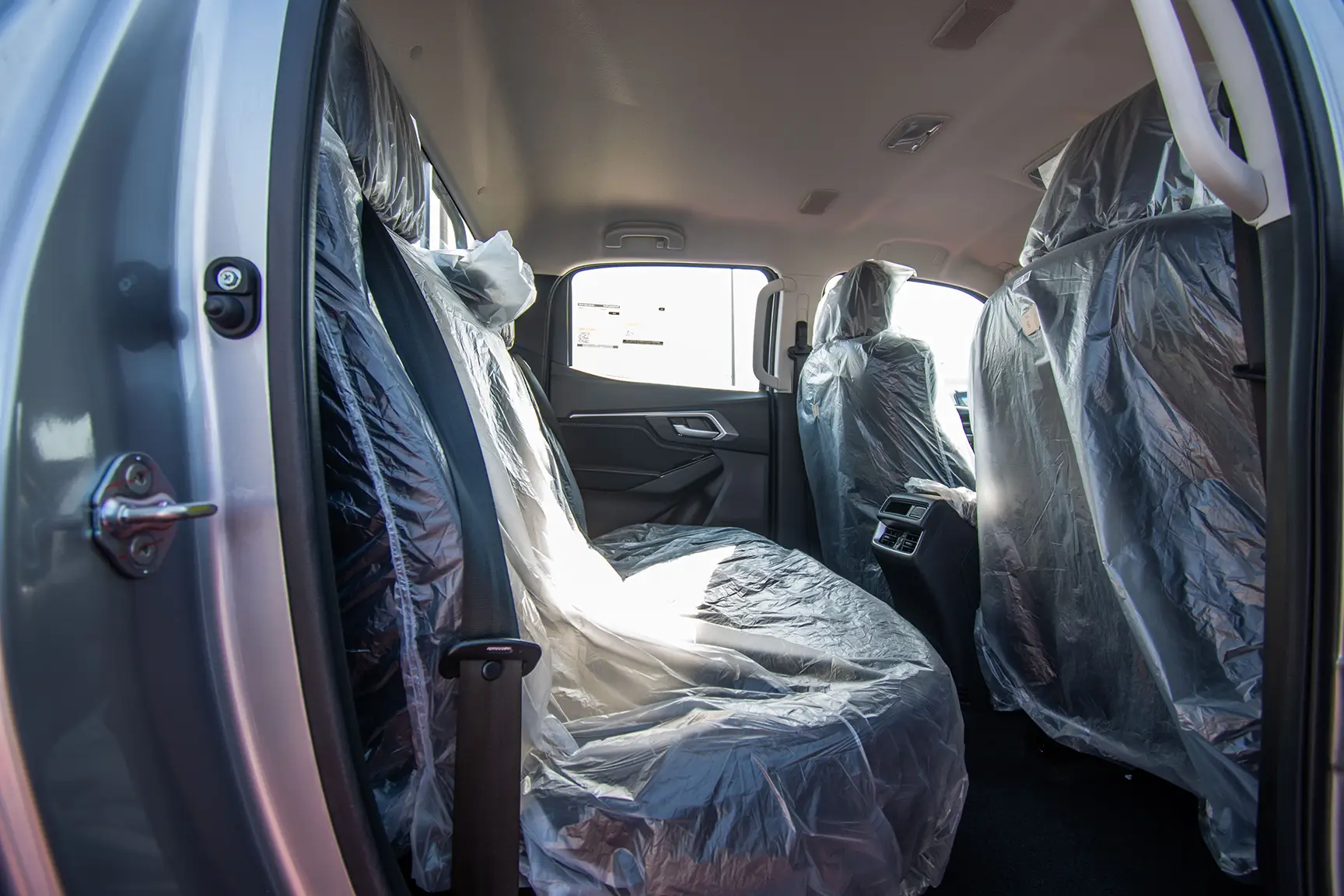 Used 2022 Isuzu D-MAX LS Silver – Rear Passenger Side Cabin View at First Choice Cars Sharjah