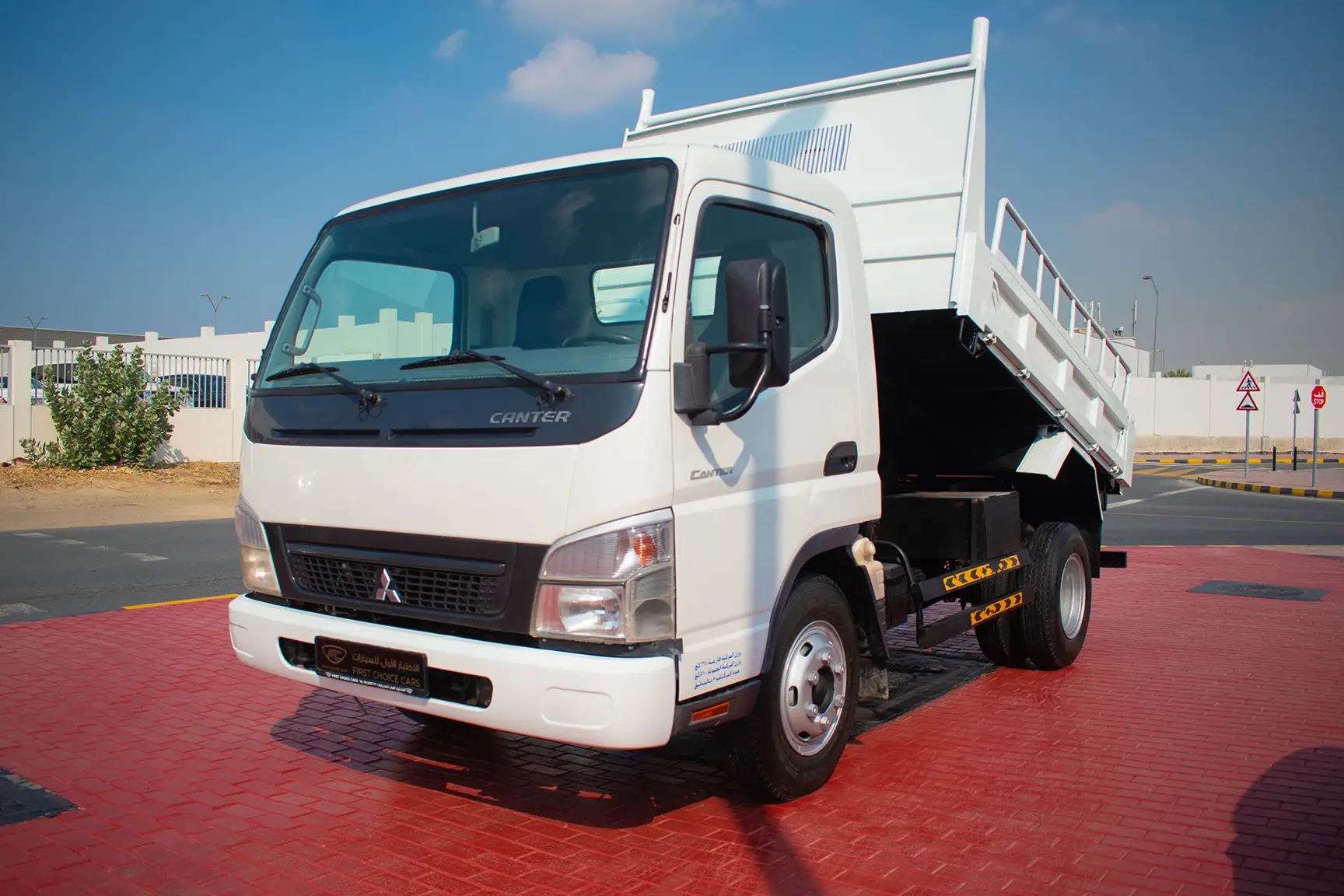 Used 2016 Mitsubishi Canter Tipper in White – Left Front Diagonal (45°) View for Sale at First Choice Cars Dubai Sharjah