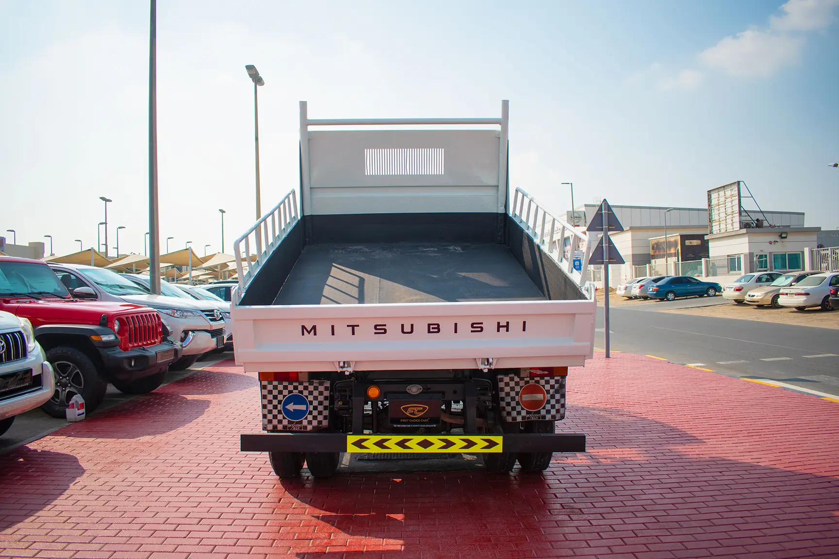 Used 2016 Mitsubishi Canter Tipper White – Back/Rear View at First Choice Cars Sharjah