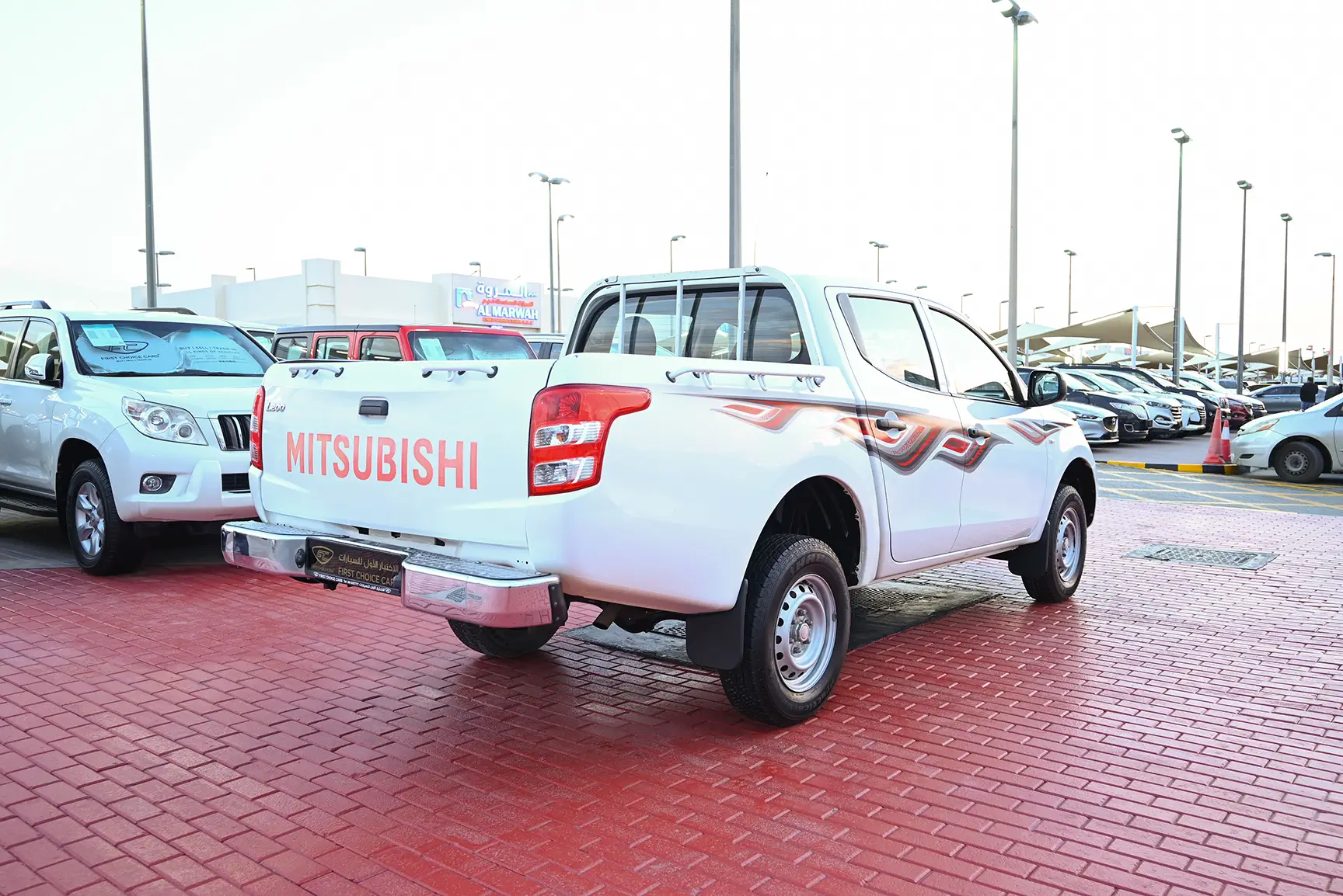 Used 2017 Mitsubishi L200 GL Double Cabin in White – Right Back Diagonal (45°) View for Sale at First Choice Cars Dubai Sharjah