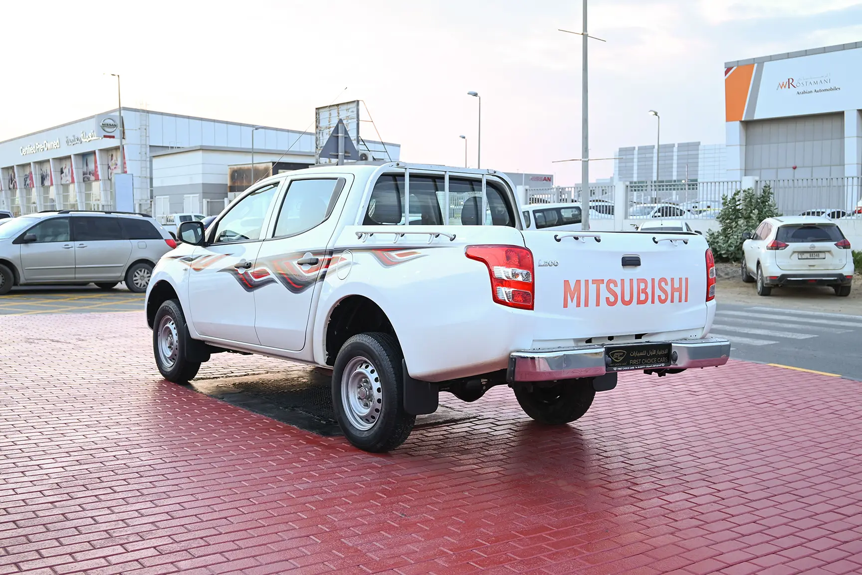 Used 2017 Mitsubishi L200 GL Double Cabin in White – Left Back Diagonal (45°) View for Sale at First Choice Cars Dubai Sharjah
