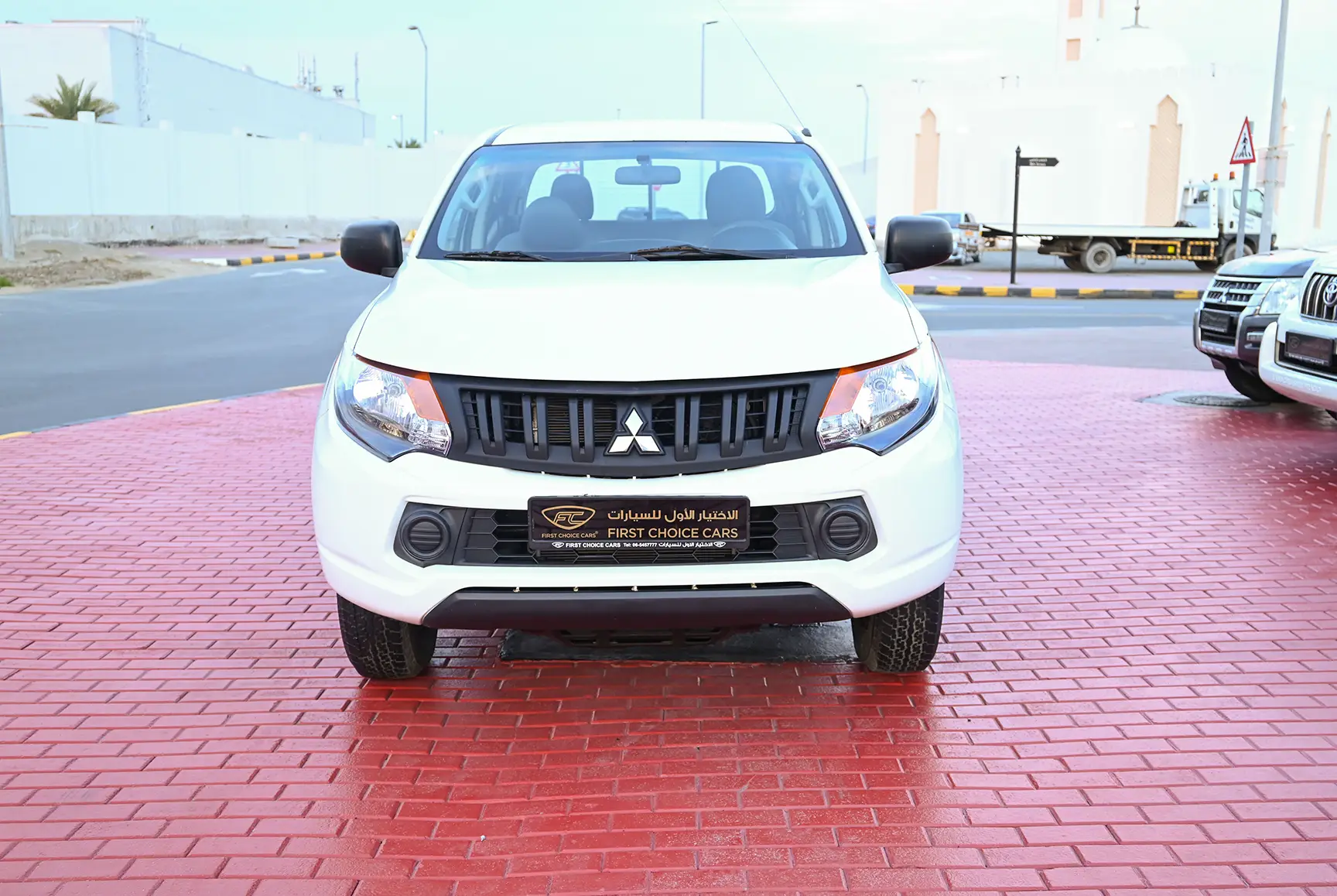 Used 2017 Mitsubishi L200 GL Double Cabin in White – Front View for Sale at First Choice Cars Dubai Sharjah