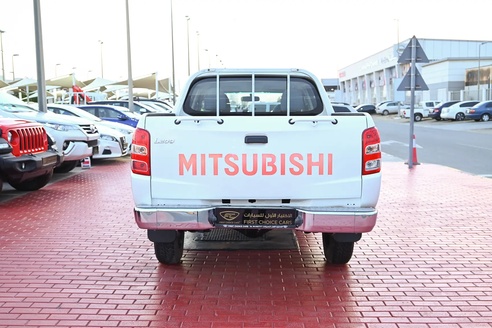 Used 2017 Mitsubishi L200 GL Double Cabin in White – Back/Rear View for Sale at First Choice Cars Dubai Sharjah
