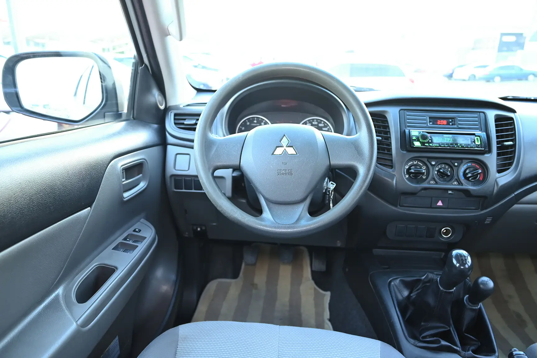 Used 2017 Mitsubishi L200 GL Double Cabin in White – Steering Wheel & Instrument Cluster for Sale at First Choice Cars Dubai Sharjah