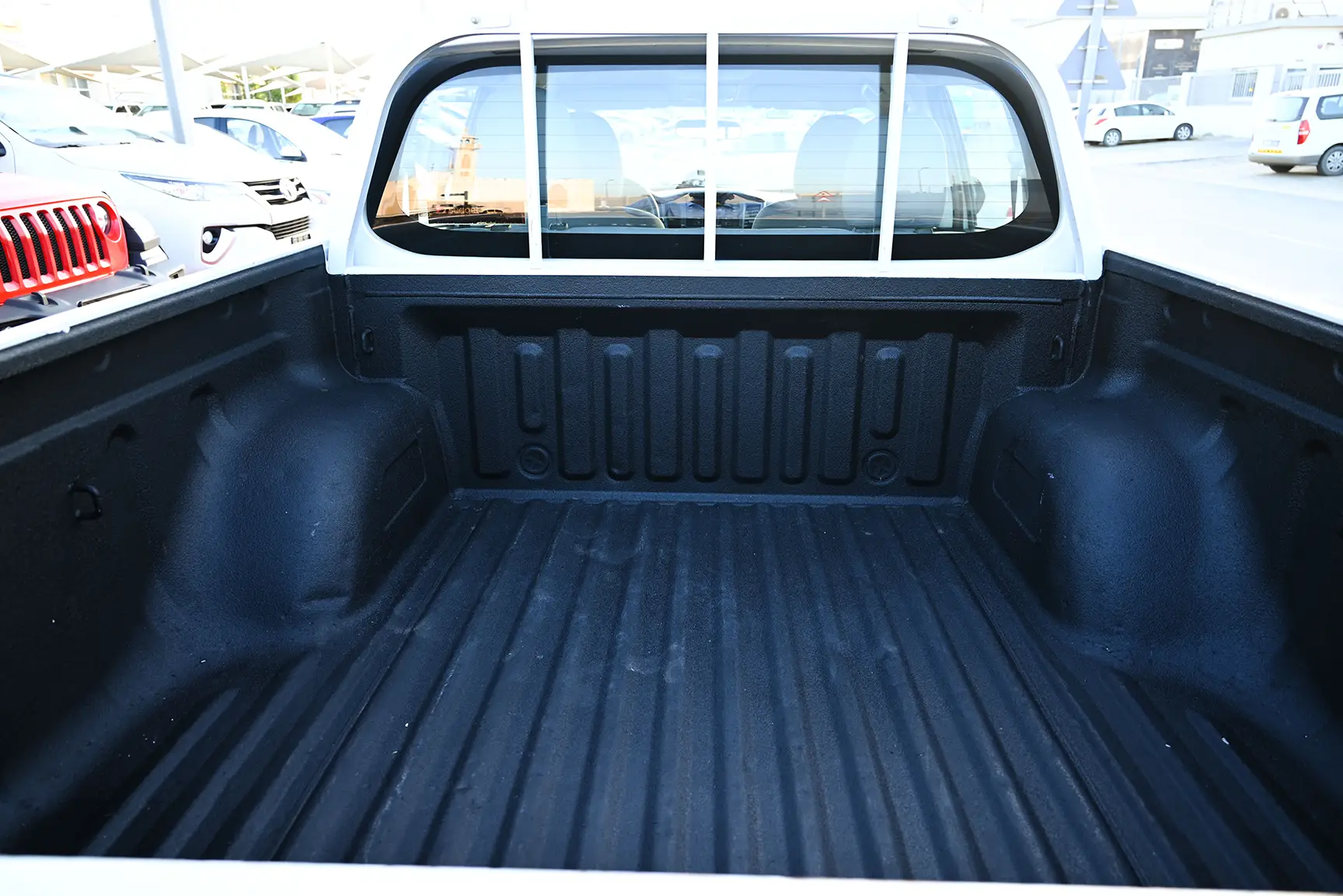 Used 2020 Mitsubishi L200 Double Cab GL White – Boot / Trunk Space Open View at First Choice Cars Sharjah