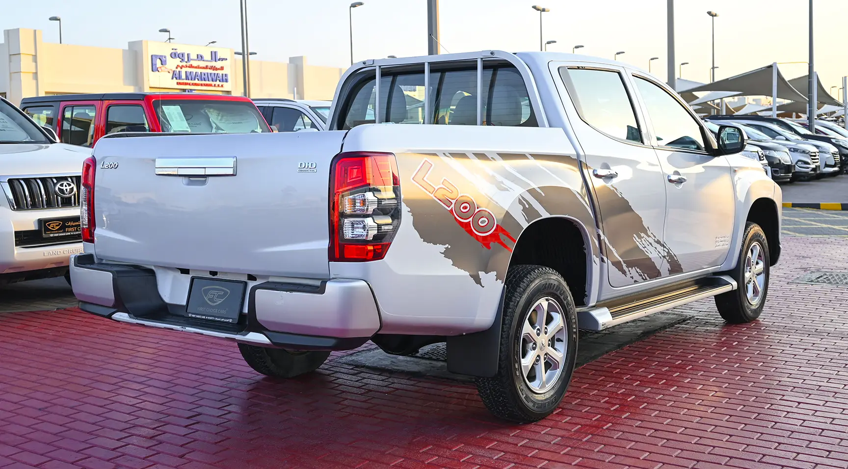 Used 2020 Mitsubishi L200 GL Double Cabin in White – Right Back Diagonal (45°) View for Sale at First Choice Cars Dubai Sharjah