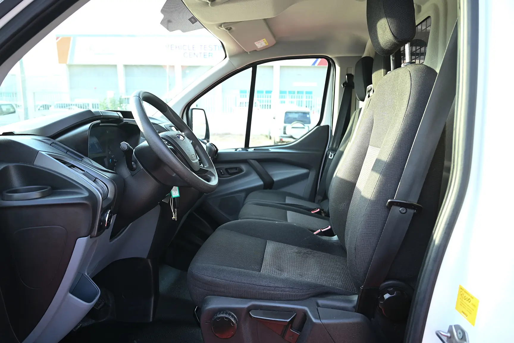 Used 2018 Ford Transit 150xl Low Roof White – Front Driver Side Cabin View at First Choice Cars Sharjah