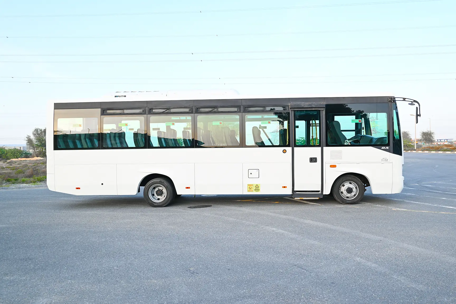 Used 2020 Mitsubishi Fuso Bus 37-Seater White – Right Back Diagonal (45°) View at First Choice Cars Sharjah