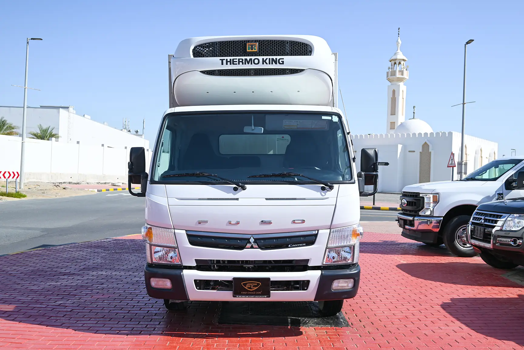 Used 2022 Mitsubishi Canter Freezer Box White – Front View at First Choice Cars Sharjah