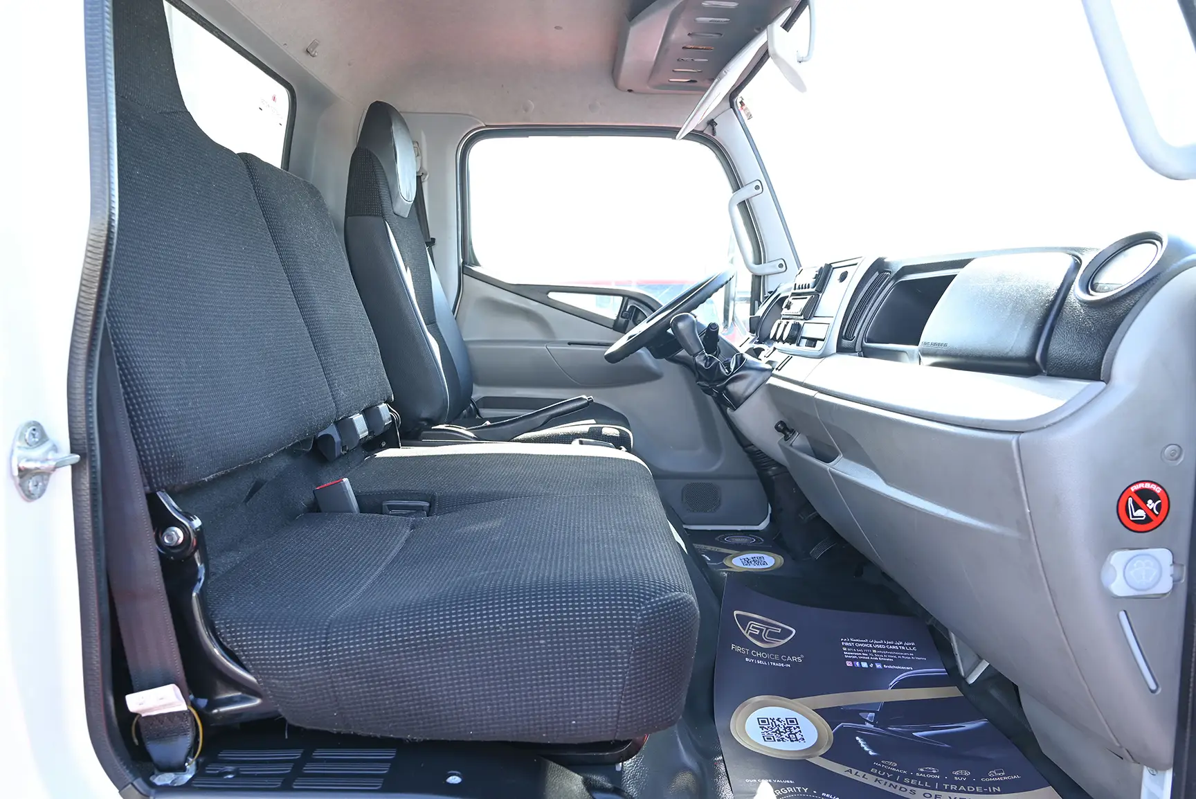 Used 2022 Mitsubishi Canter Freezer Box White – Front Passenger Side Cabin View at First Choice Cars Sharjah