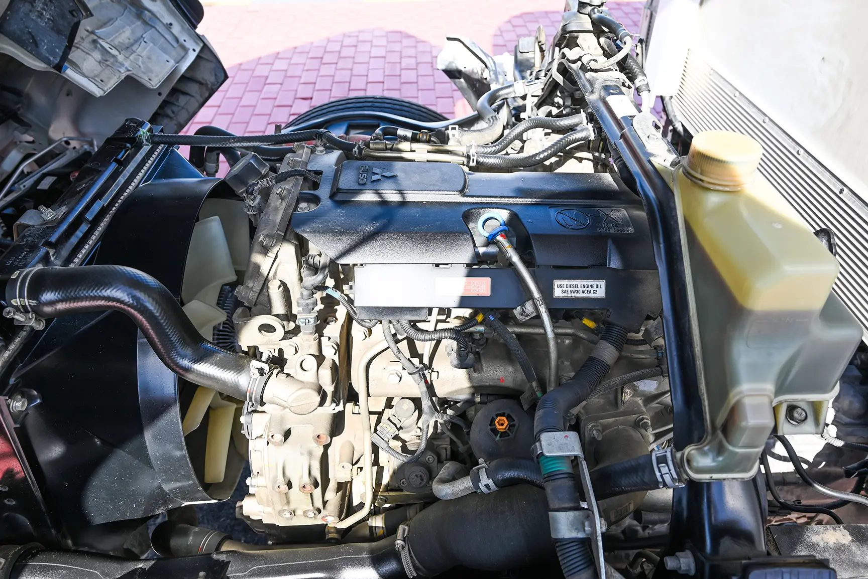 Used 2022 Mitsubishi Canter Freezer Box White – Engine Bay View at First Choice Cars Sharjah