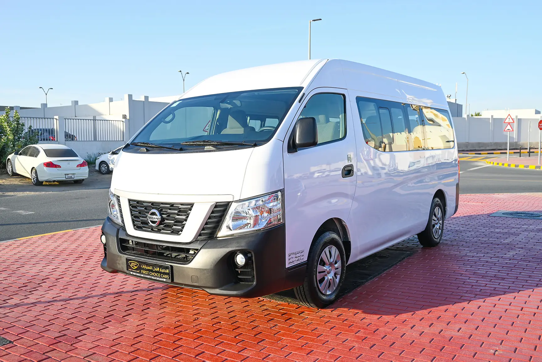 Used 2021 Nissan Urvan High Roof White – Left Front Diagonal (45°) View at First Choice Cars Sharjah