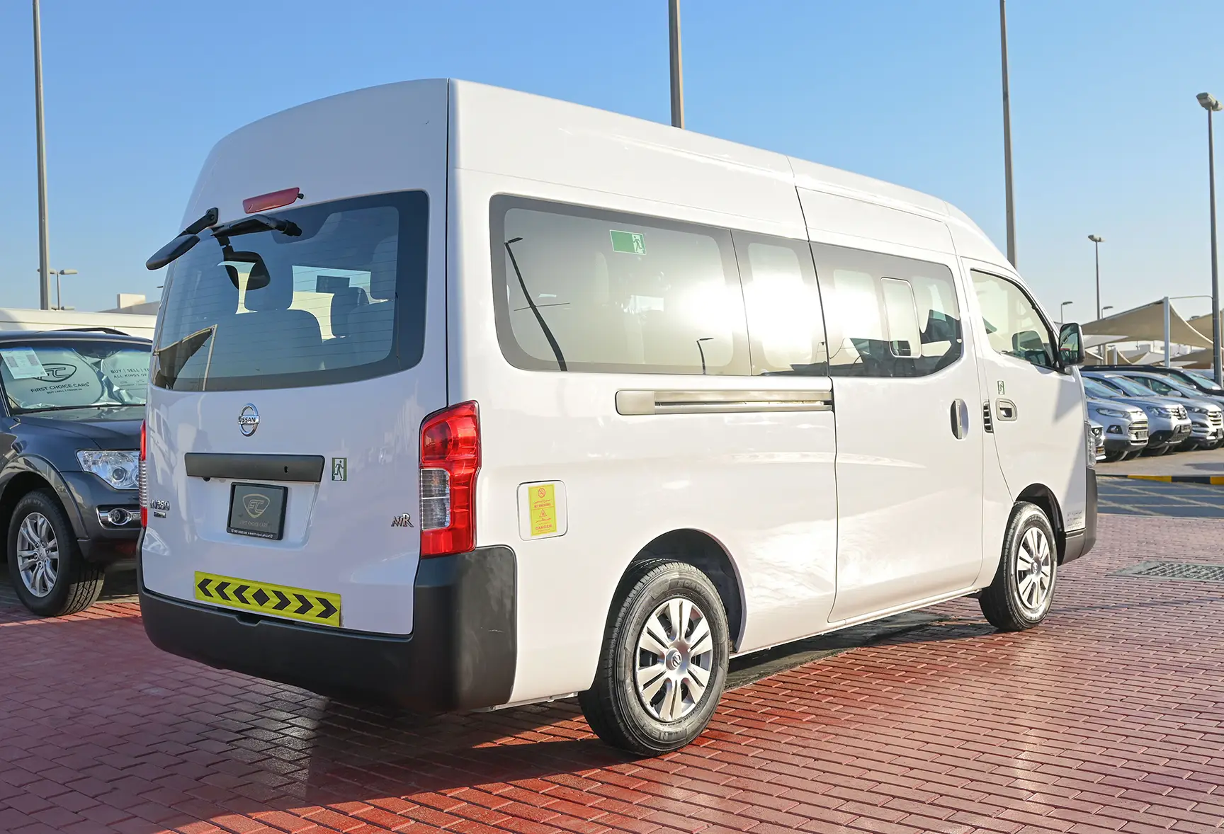 Used 2021 Nissan Urvan High Roof White – Right Back Diagonal (45°) View at First Choice Cars Sharjah