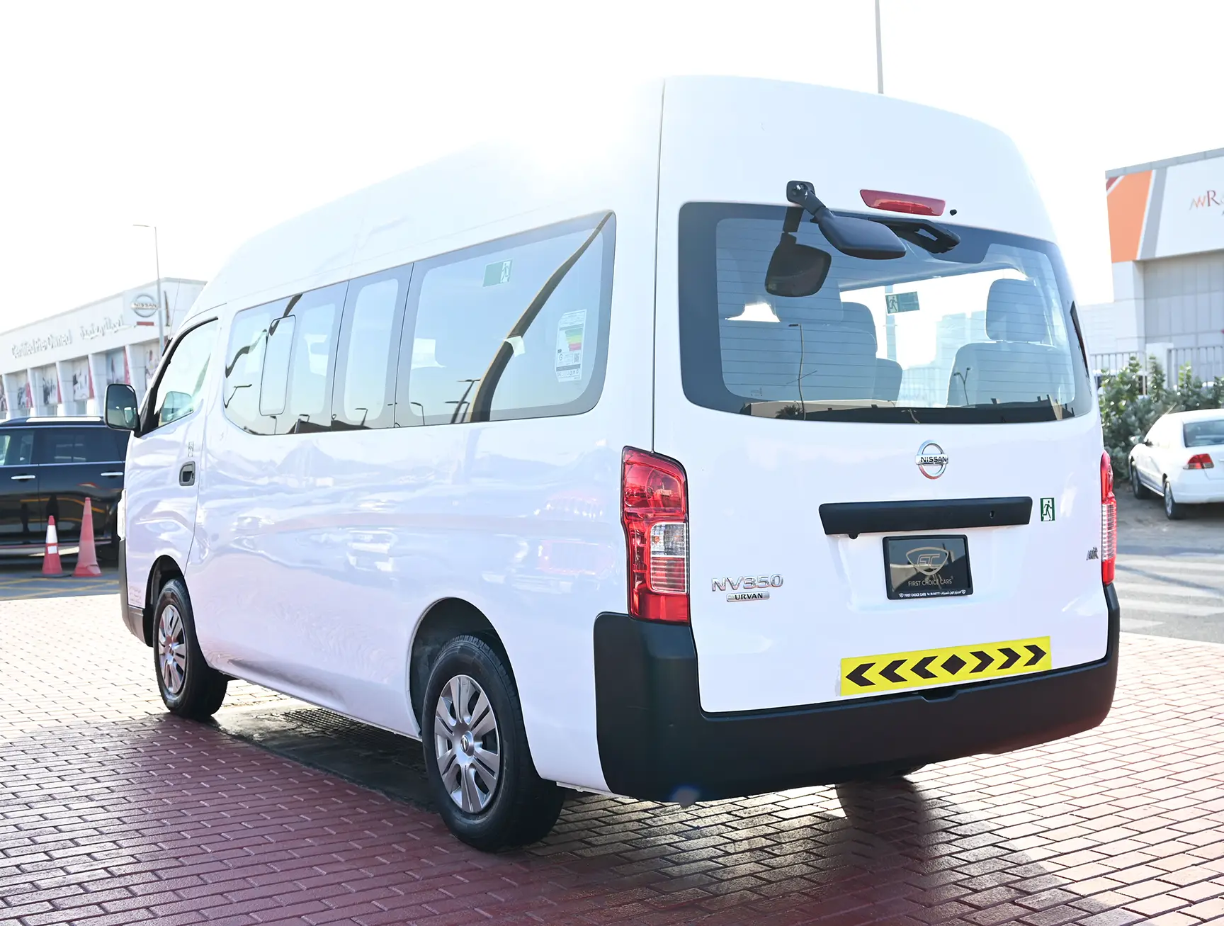 Used 2021 Nissan Urvan High Roof White – Left Back Diagonal (45°) View at First Choice Cars Sharjah