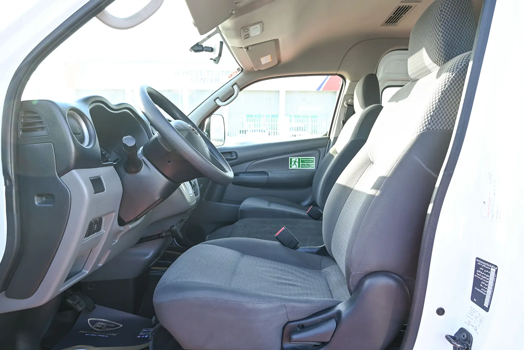 Used 2021 Nissan Urvan High Roof White – Front Driver Side Cabin View at First Choice Cars Sharjah