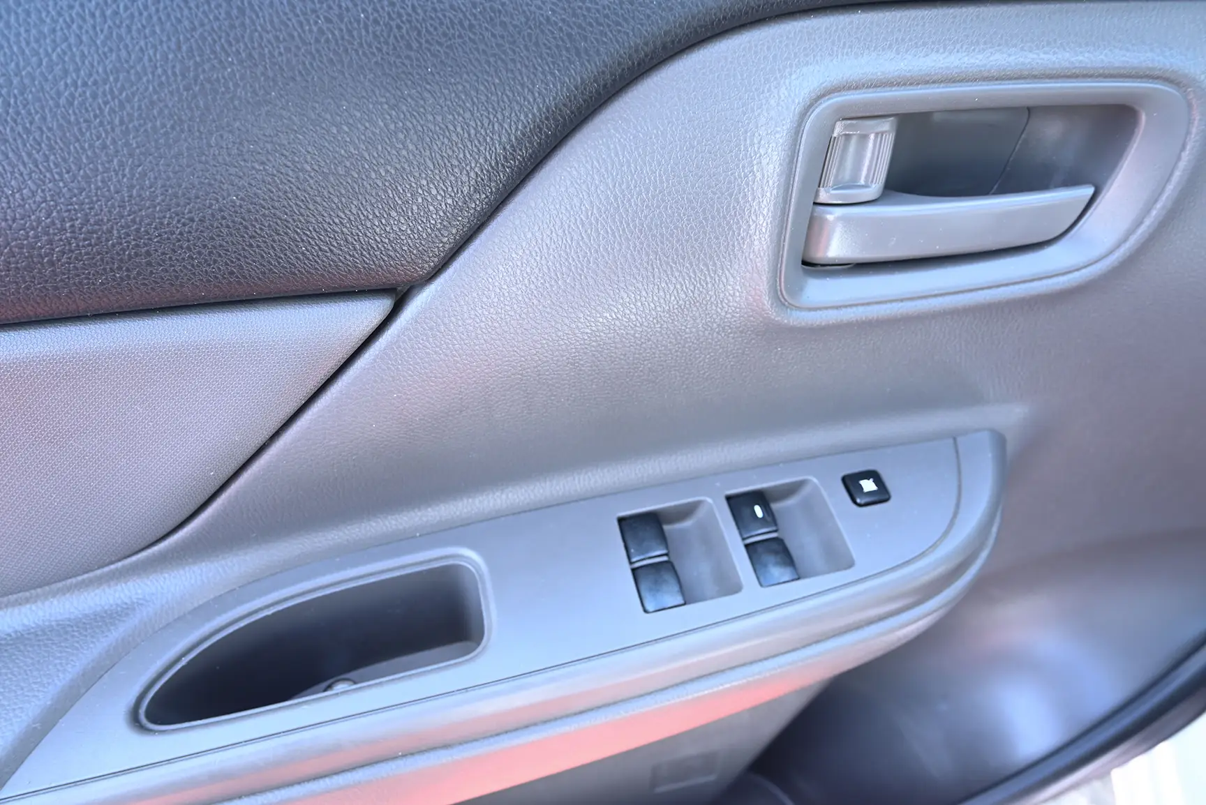 Used 2018 Mitsubishi L200 Double Cab GL White – Driver Door Panel Full View at First Choice Cars Sharjah