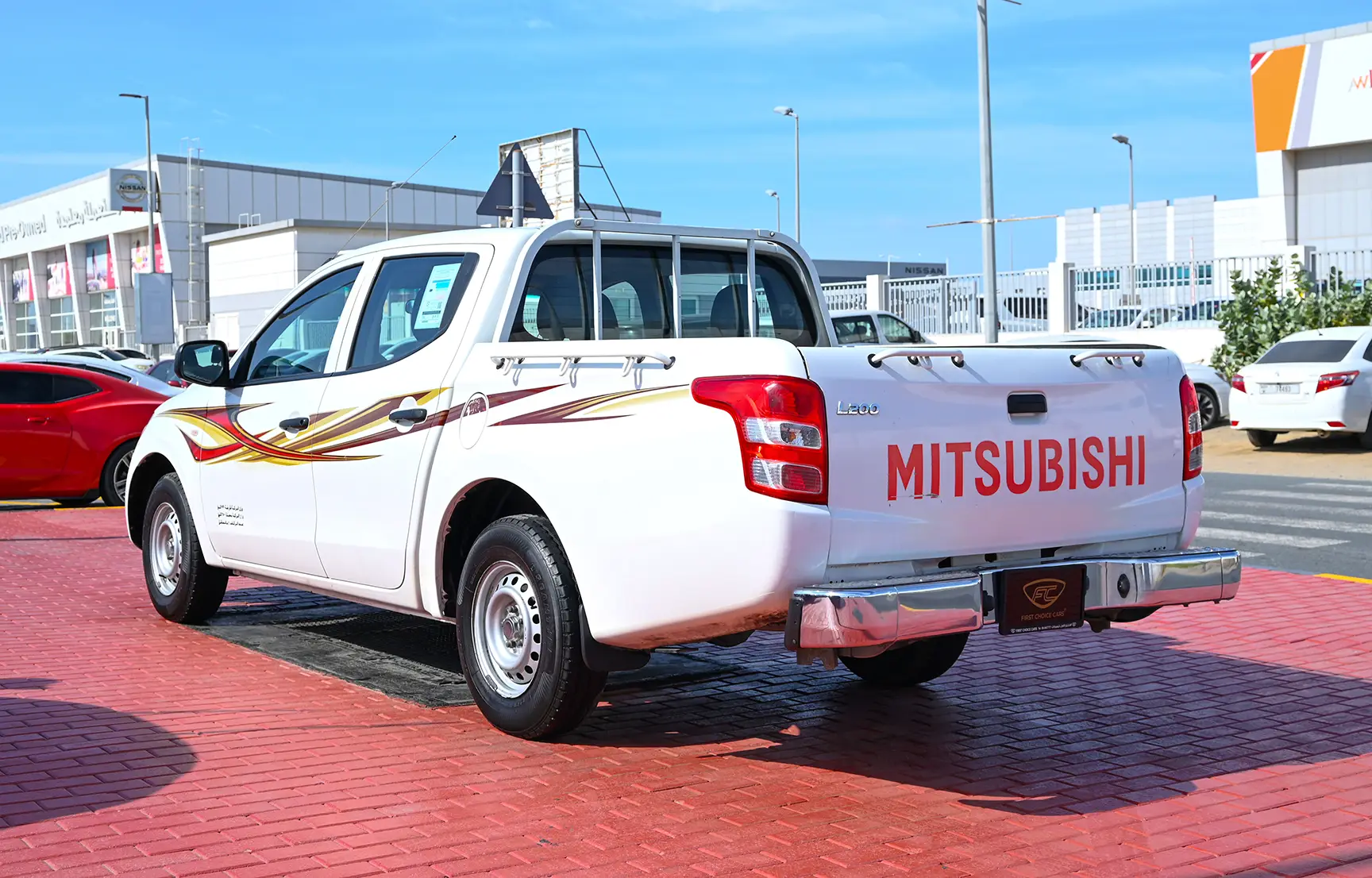 Used 2018 Mitsubishi L200 GL Double Cabin in White – Left Back Diagonal (45°) View for Sale at First Choice Cars Dubai Sharjah
