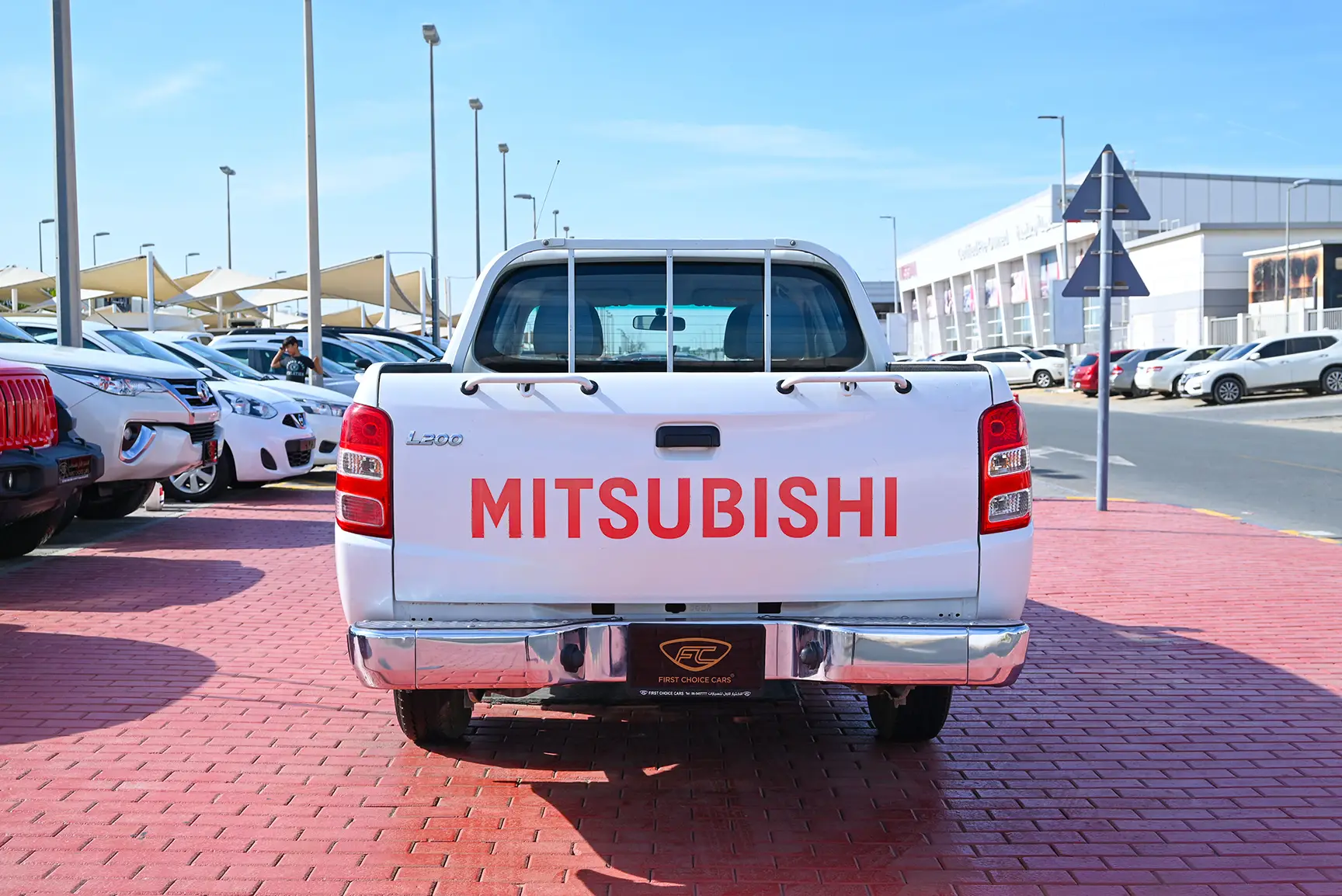Used 2018 Mitsubishi L200 GL Double Cabin in White – Back/Rear View for Sale at First Choice Cars Dubai Sharjah