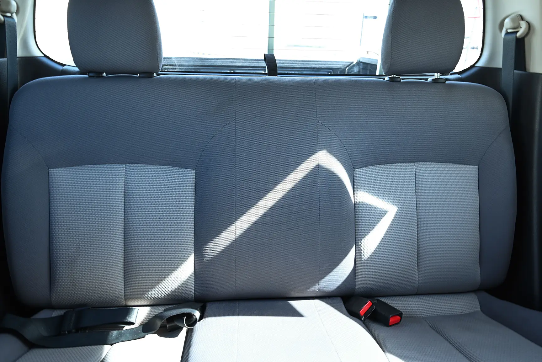 Used 2018 Mitsubishi L200 GL Double Cabin in White – Rear Seat View for Sale at First Choice Cars Dubai Sharjah