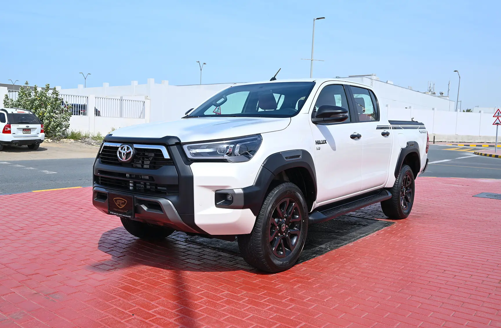 Used 2020 Toyota Hilux Adventure Double Cabin White – Left Front Diagonal (45°) View at First Choice Cars Sharjah