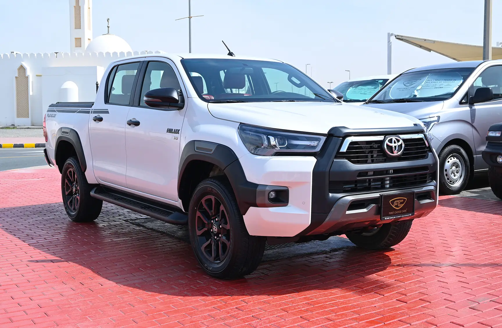 Used 2020 Toyota Hilux Adventure Double Cabin White – Right Front Diagonal (45°) View at First Choice Cars Sharjah