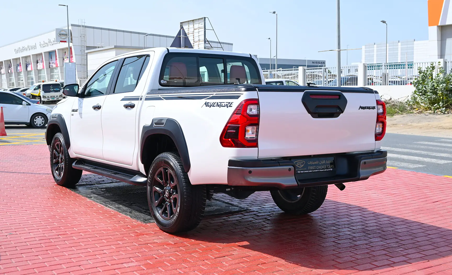 Used 2020 Toyota Hilux Adventure Double Cabin White – Left Back Diagonal (45°) View at First Choice Cars Sharjah