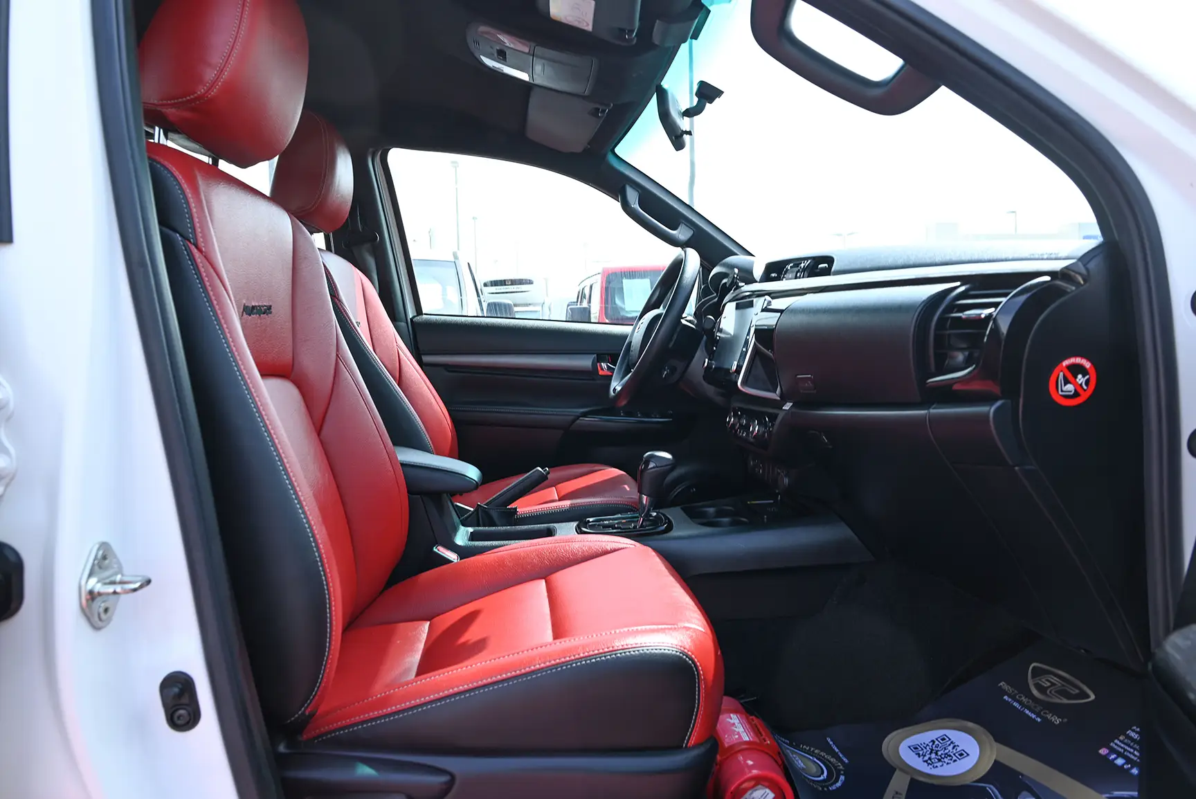 Used 2020 Toyota Hilux Adventure Double Cabin White – Front Passenger Side Cabin View at First Choice Cars Sharjah