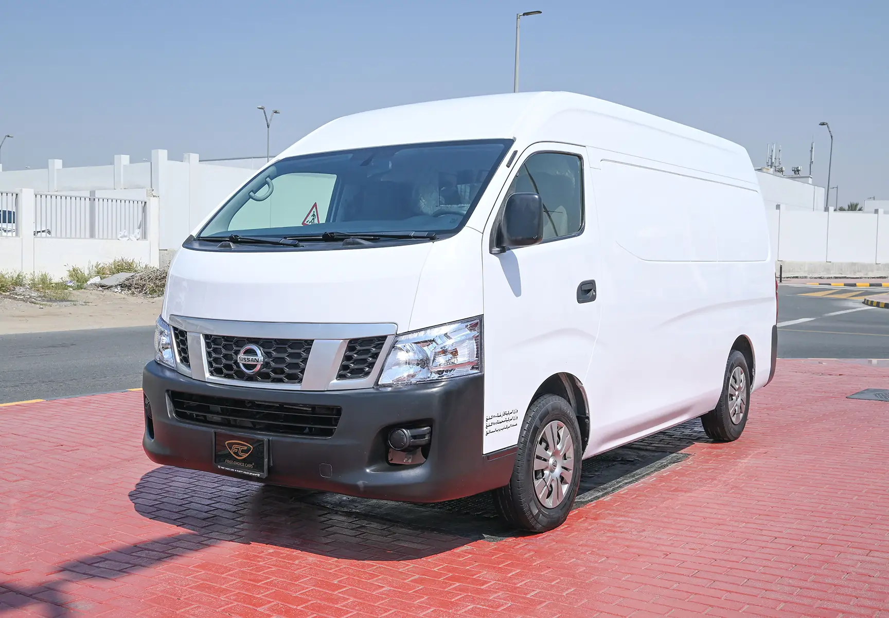 Used 2016 Nissan Urvan High Roof White – Left Front Diagonal (45°) View at First Choice Cars Sharjah