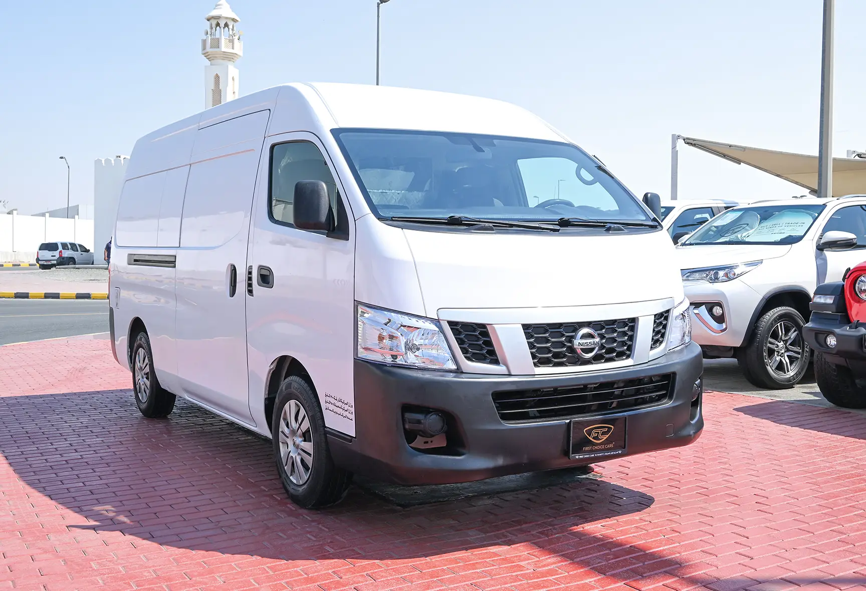Used 2016 Nissan Urvan High Roof White – Right Front Diagonal (45°) View at First Choice Cars Sharjah