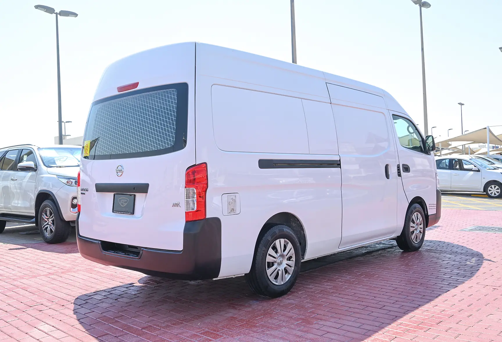 Used 2016 Nissan Urvan High Roof White – Right Back Diagonal (45°) View at First Choice Cars Sharjah