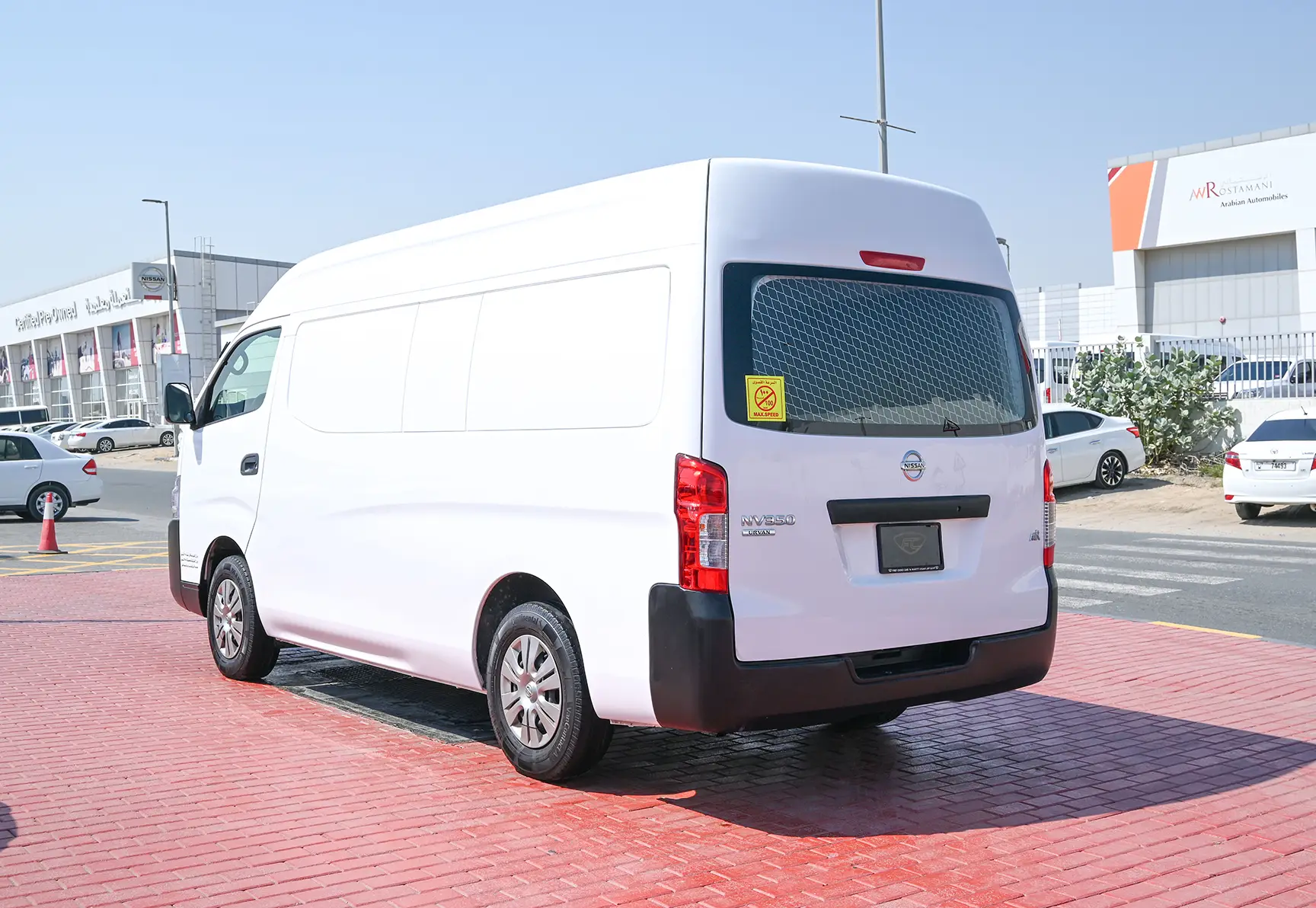 Used 2016 Nissan Urvan High Roof White – Left Back Diagonal (45°) View at First Choice Cars Sharjah