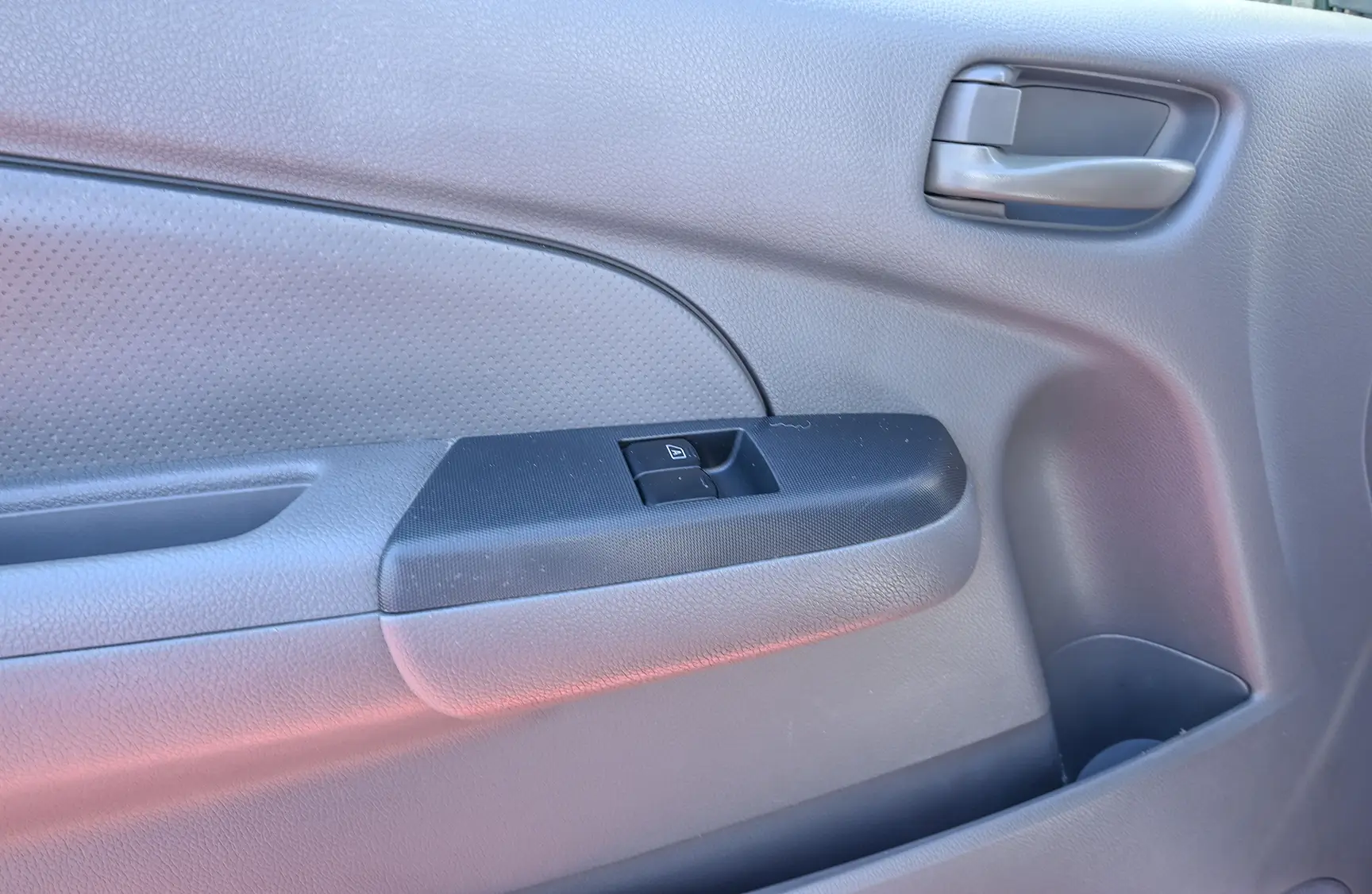 Used 2016 Nissan Urvan High Roof White – Driver Door Panel Full View at First Choice Cars Sharjah