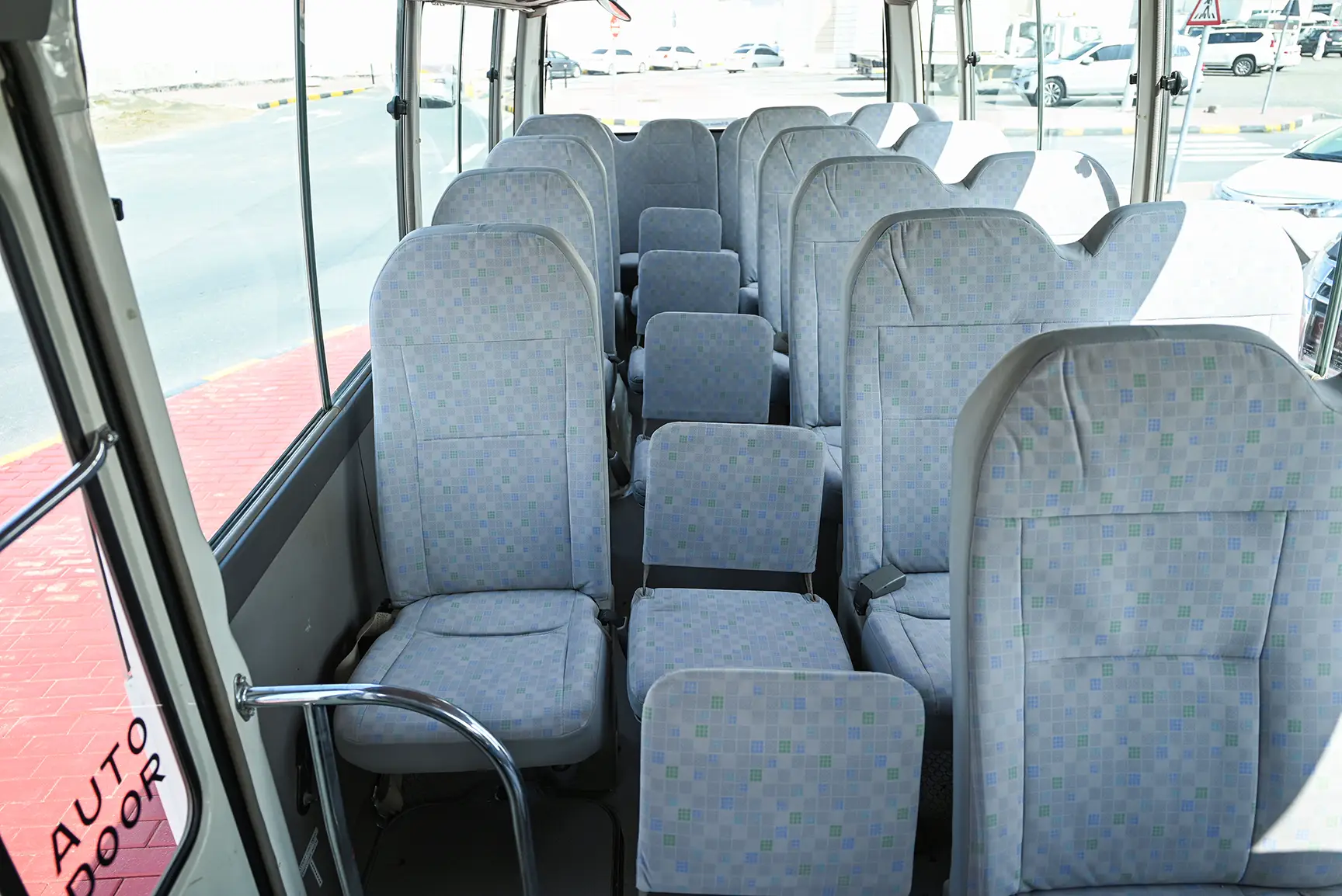 Used 2016 Toyota Coaster Dls Std Roof 30 STR 4.2L Diesel White – Rear Seat View at First Choice Cars Sharjah