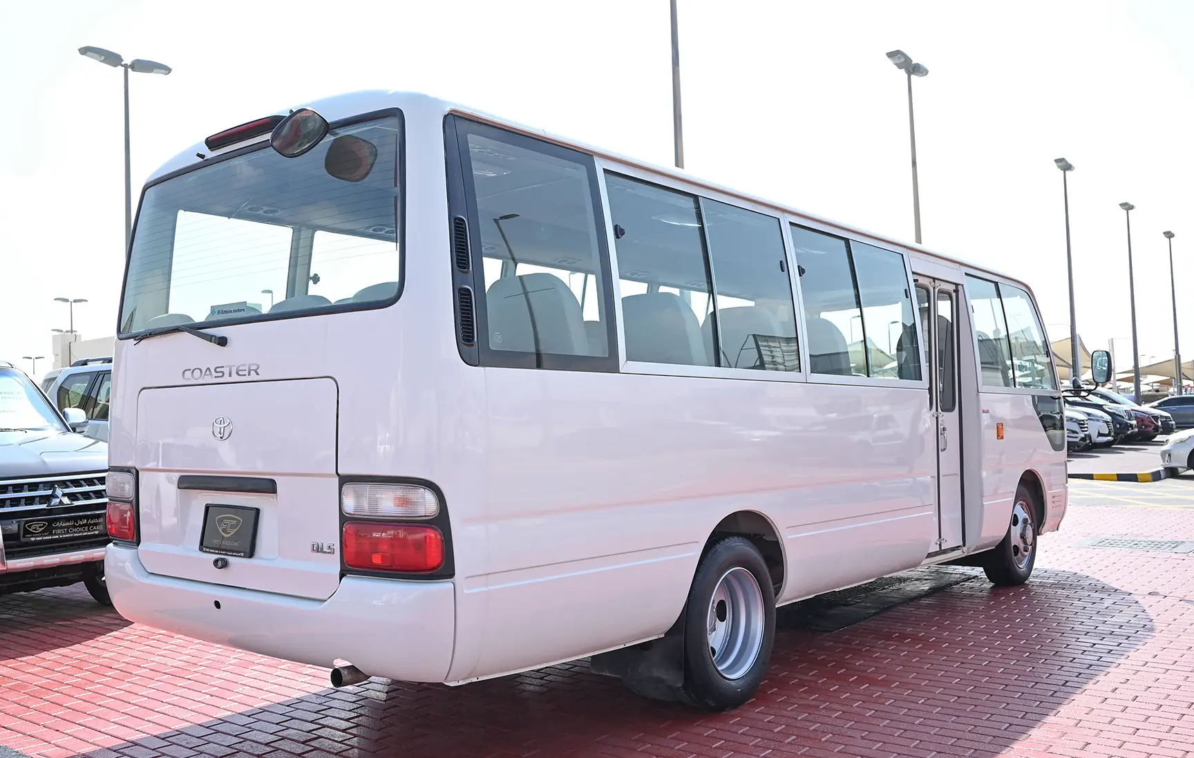 Used 2016 Toyota Coaster Standard Roof in White – Right Back Diagonal (45°) View