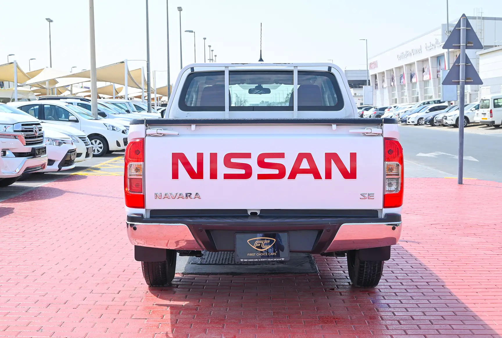 Used 2019 Nissan Navara Csf 2.5L G 2wd At White – Back/Rear View at First Choice Cars Sharjah