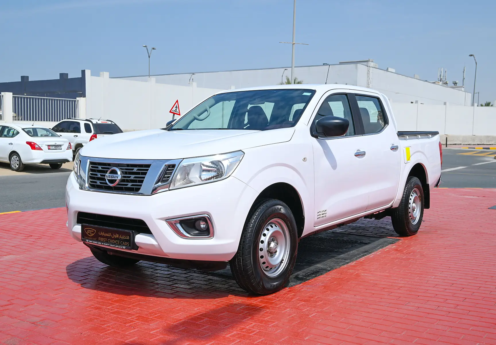 Used 2019 Nissan Navara Csf 2.5L G 2wd At White – Left Front Diagonal (45°) View at First Choice Cars Sharjah