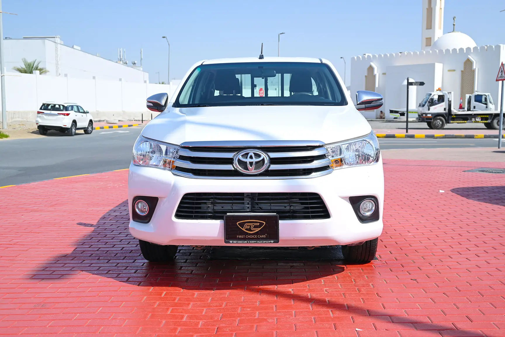 Used 2019 Toyota Hilux GLX Double Cabin White – Front View at First Choice Cars Sharjah