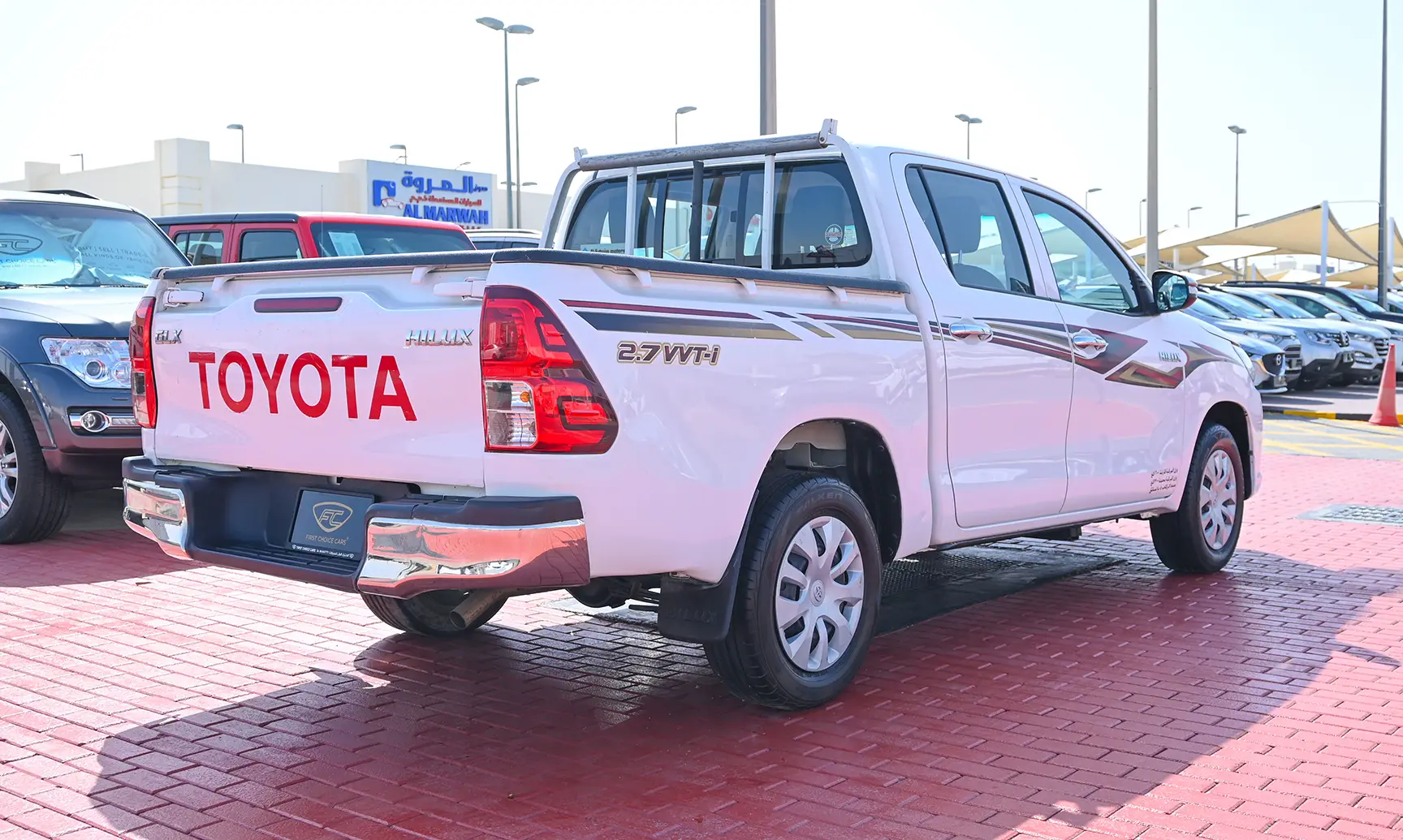 Used 2019 Toyota Hilux GLX Double Cabin White – Right Back Diagonal (45°) View at First Choice Cars Sharjah
