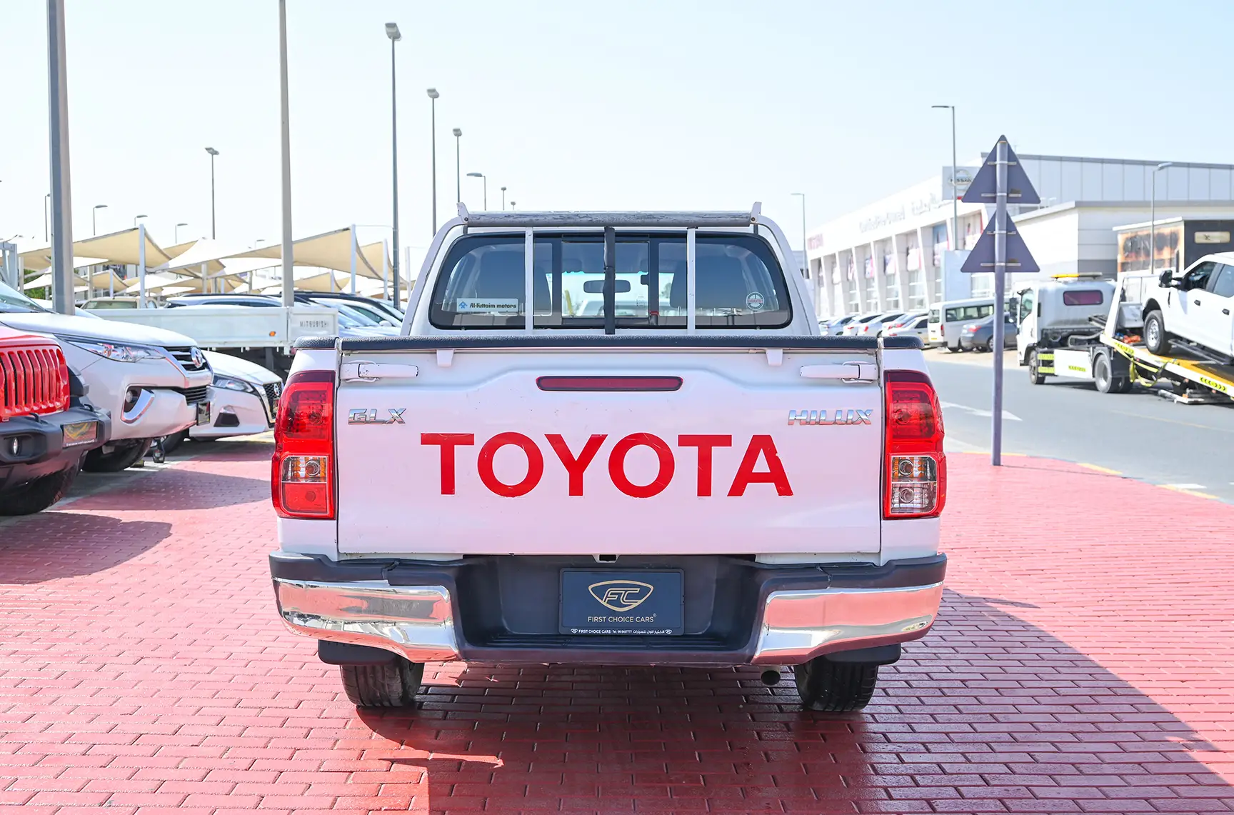 Used 2019 Toyota Hilux GLX Double Cabin White – Back/Rear View at First Choice Cars Sharjah