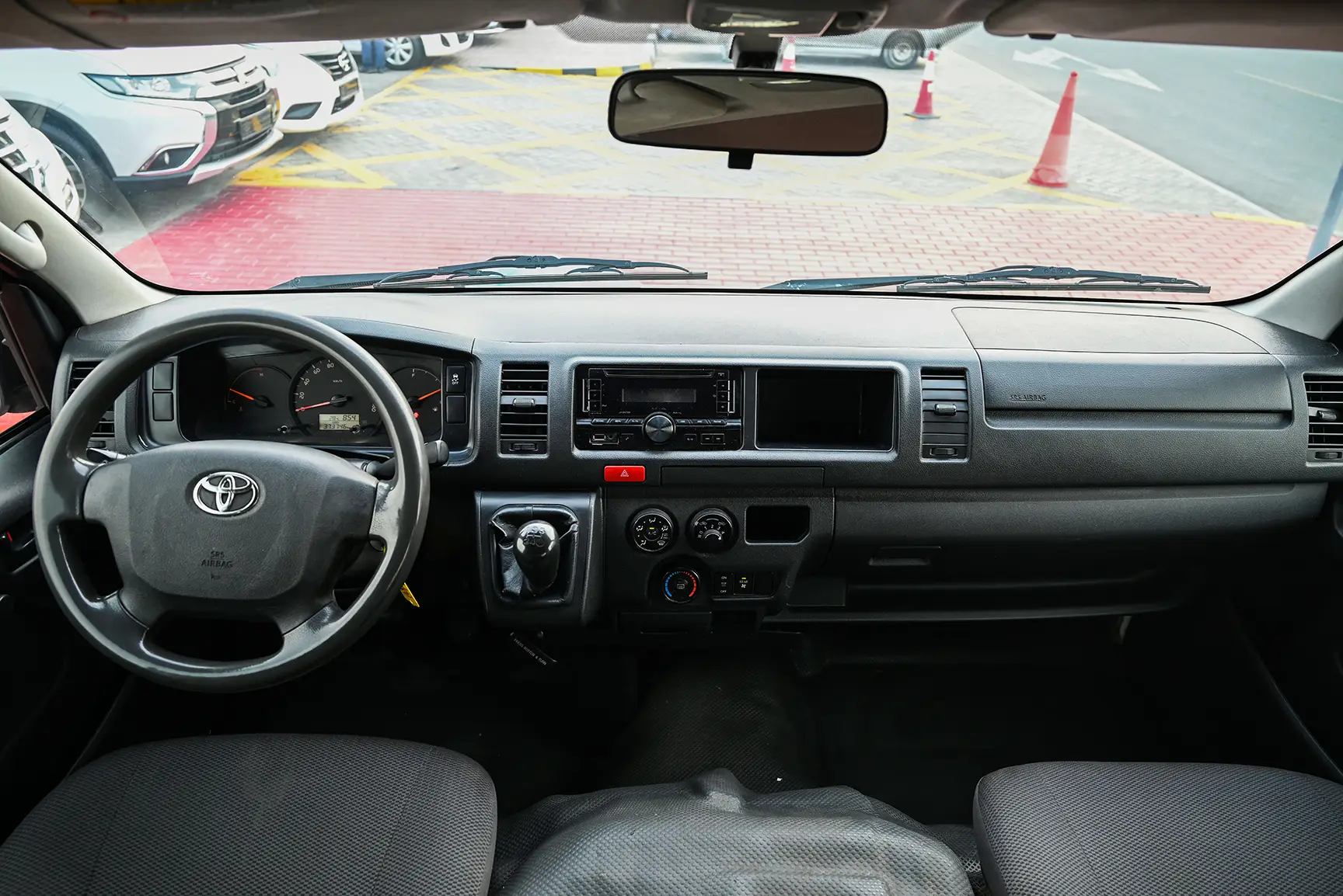 Used 2017 Toyota Hiace GL High Roof White – Front Cabin / Dashboard Full View at First Choice Cars Sharjah