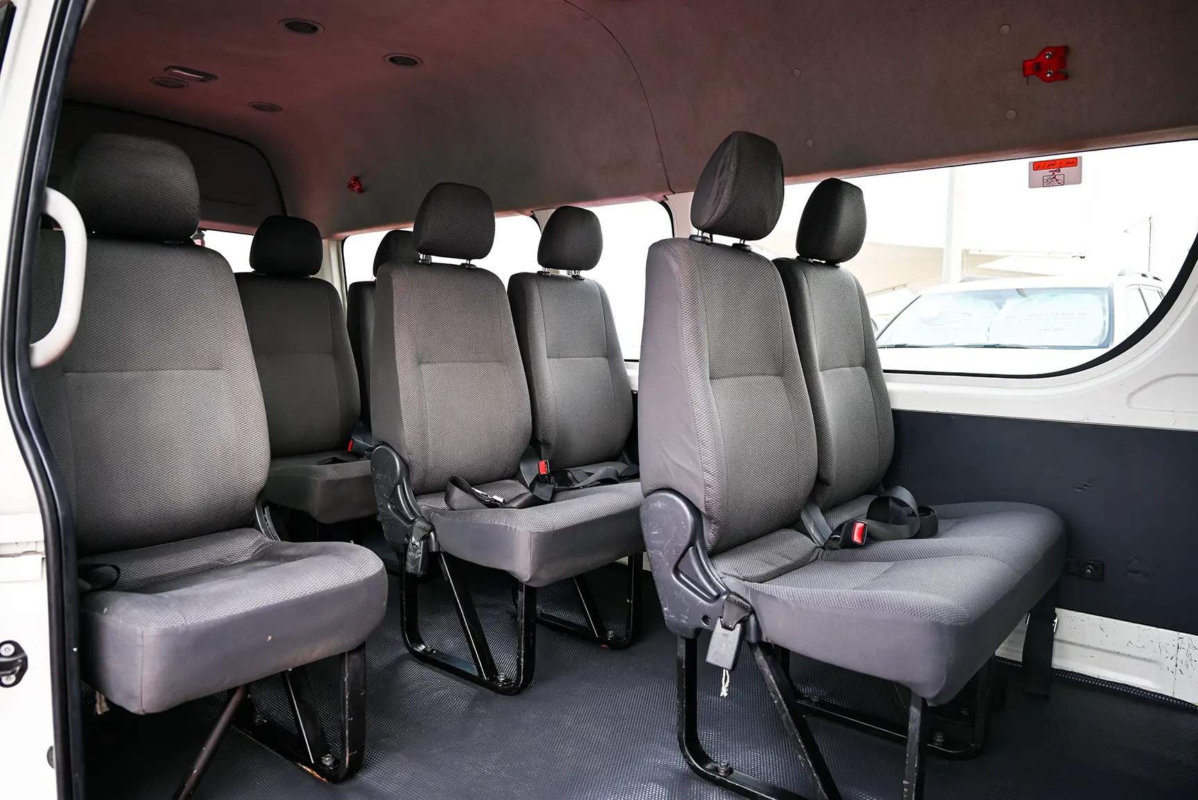 Used 2017 Toyota Hiace GL High Roof White – Rear Passenger Side Cabin View at First Choice Cars Sharjah