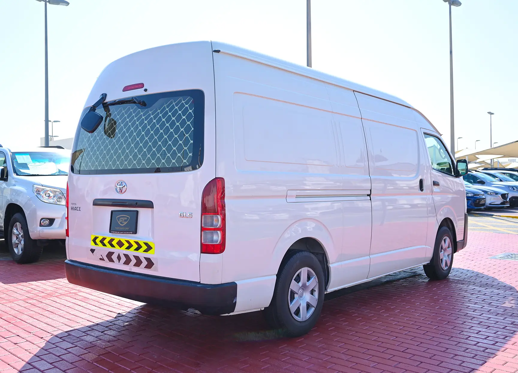 Used 2018 Toyota Hiace GLS High Roof in White – Right Back Diagonal (45°) View for Sale at First Choice Cars Dubai Sharjah