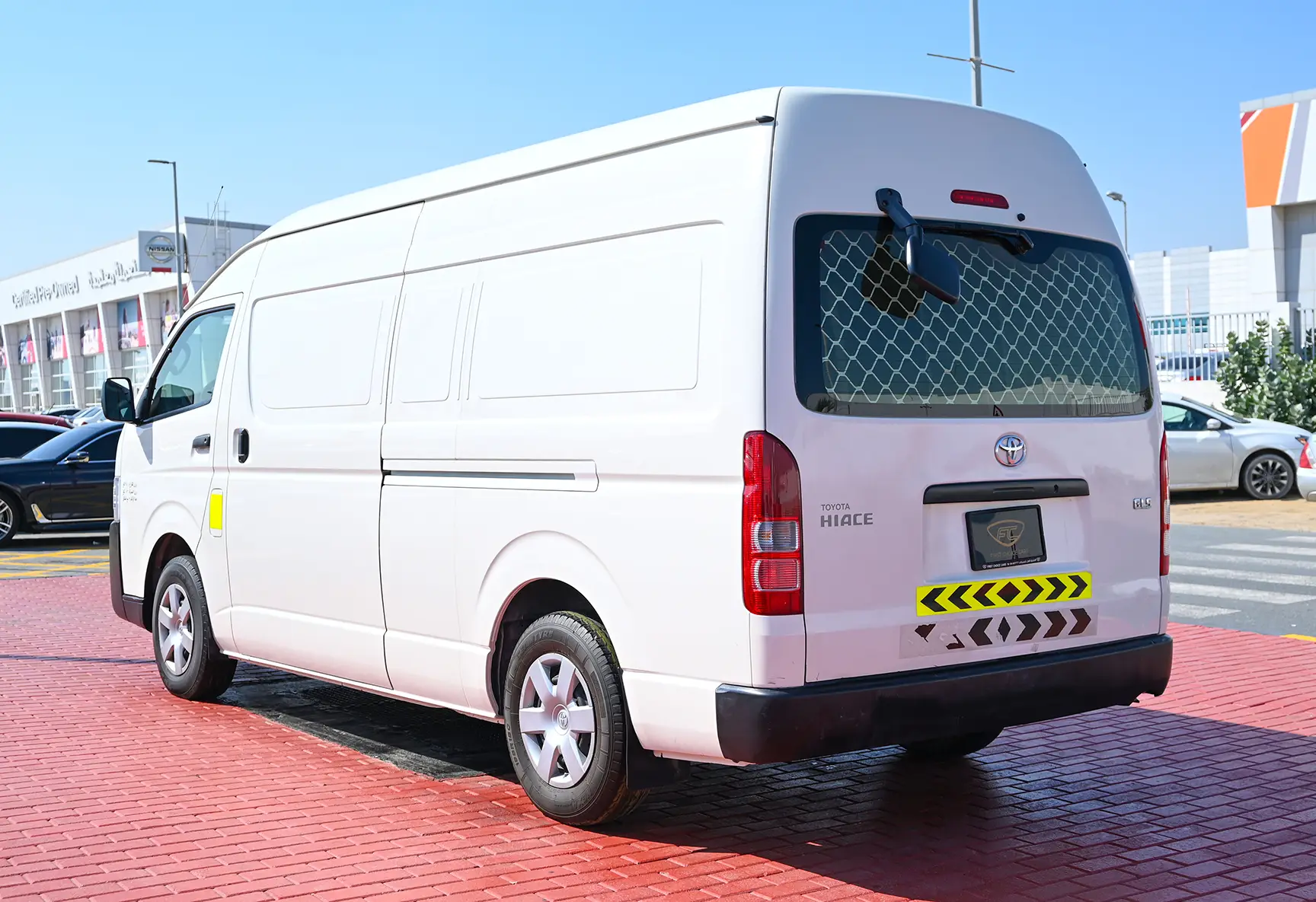 Used 2018 Toyota Hiace GLS High Roof in White – Left Back Diagonal (45°) View for Sale at First Choice Cars Dubai Sharjah