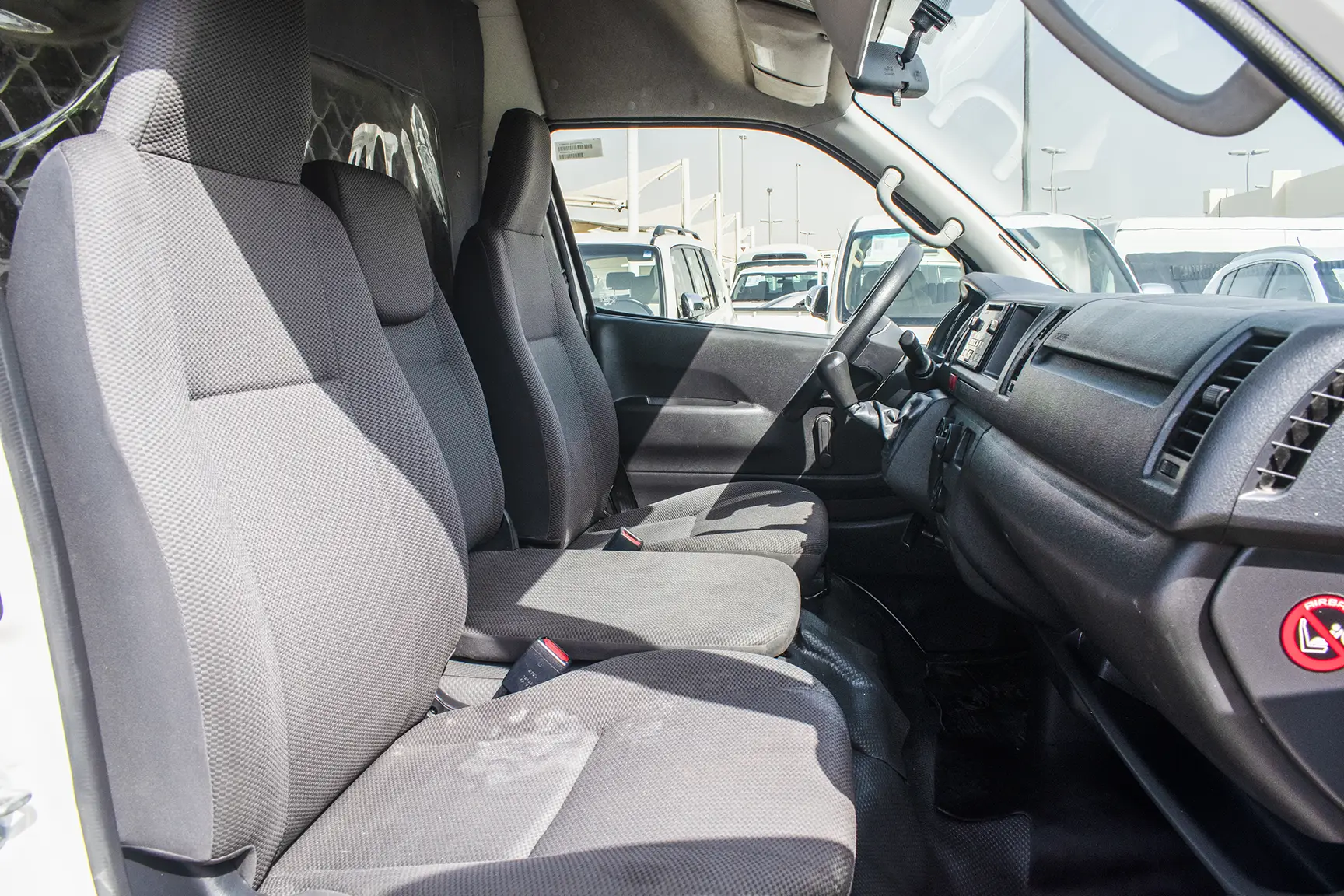 Used 2018 Toyota Hiace GLS High Roof in White – Front Passenger Side Cabin View for Sale at First Choice Cars Dubai Sharjah