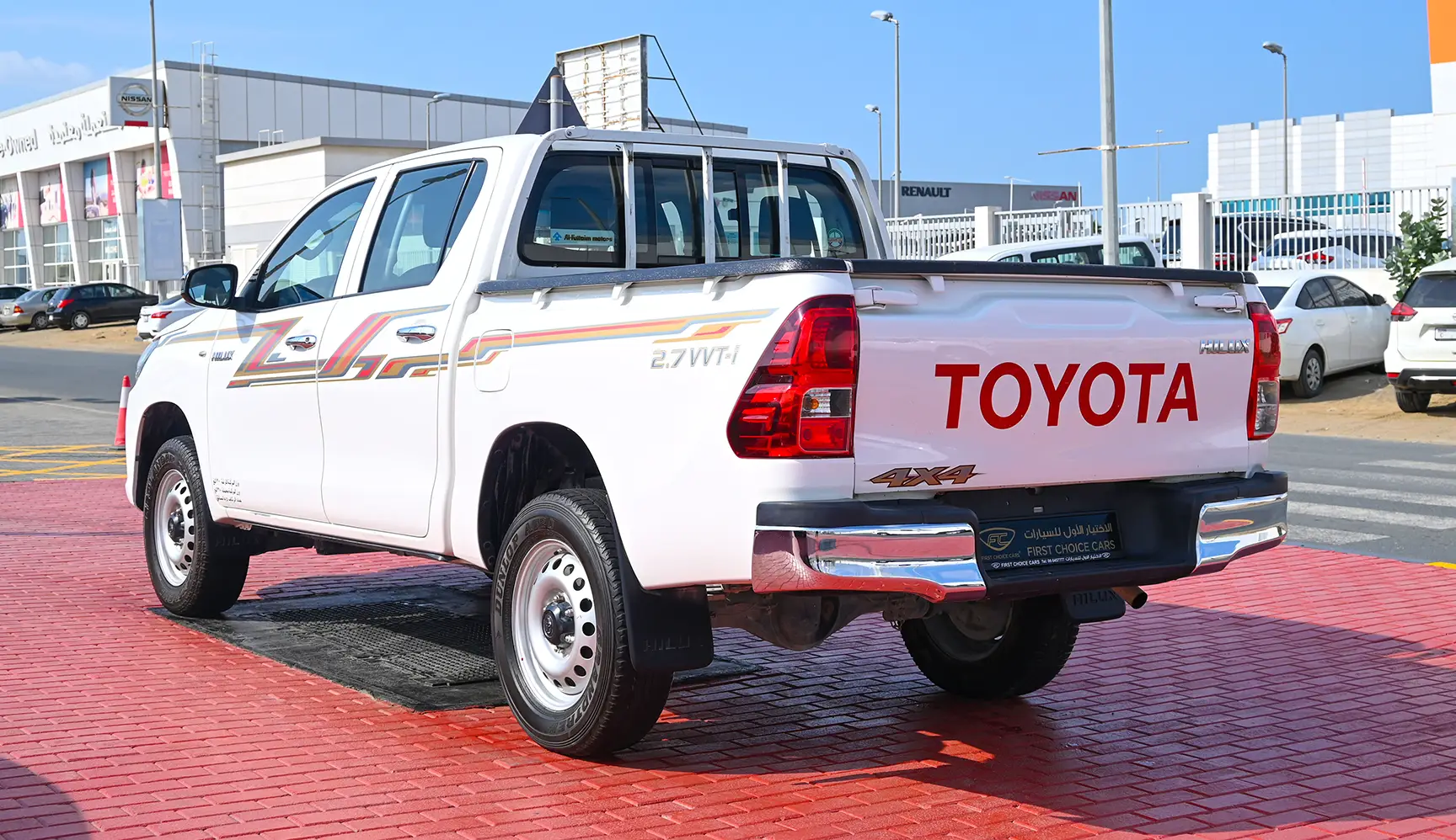 Used 2020 Toyota Hilux GL Double Cabin White – Left Back Diagonal (45°) View at First Choice Cars Sharjah
