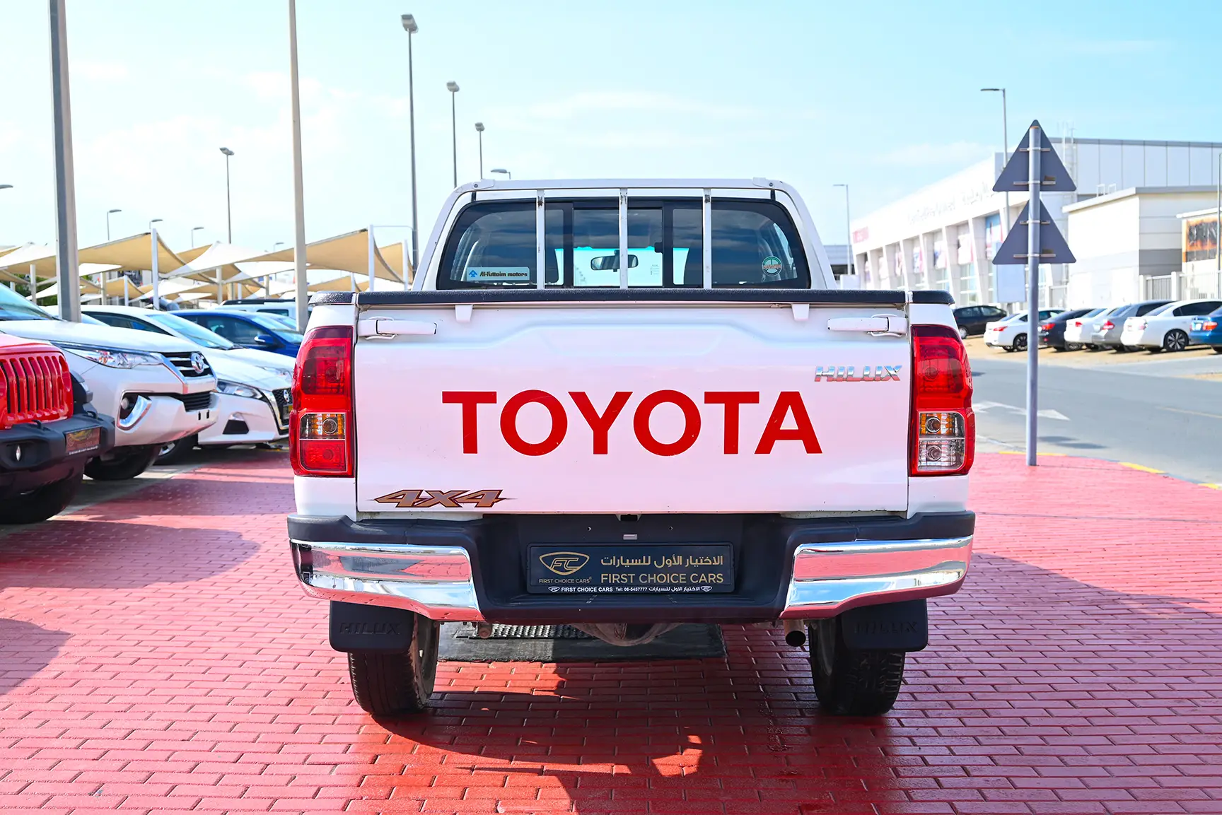 Used 2020 Toyota Hilux GL Double Cabin White – Back/Rear View at First Choice Cars Sharjah