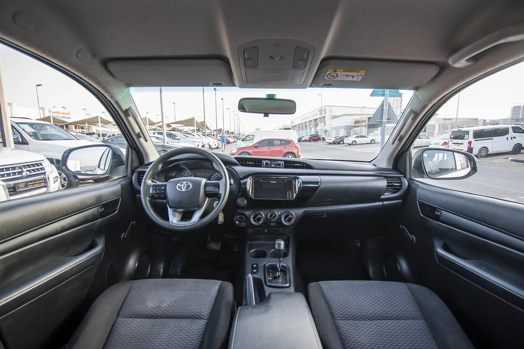 Used 2020 Toyota Hilux GL Double Cabin White – Front Cabin / Dashboard Full View at First Choice Cars Sharjah