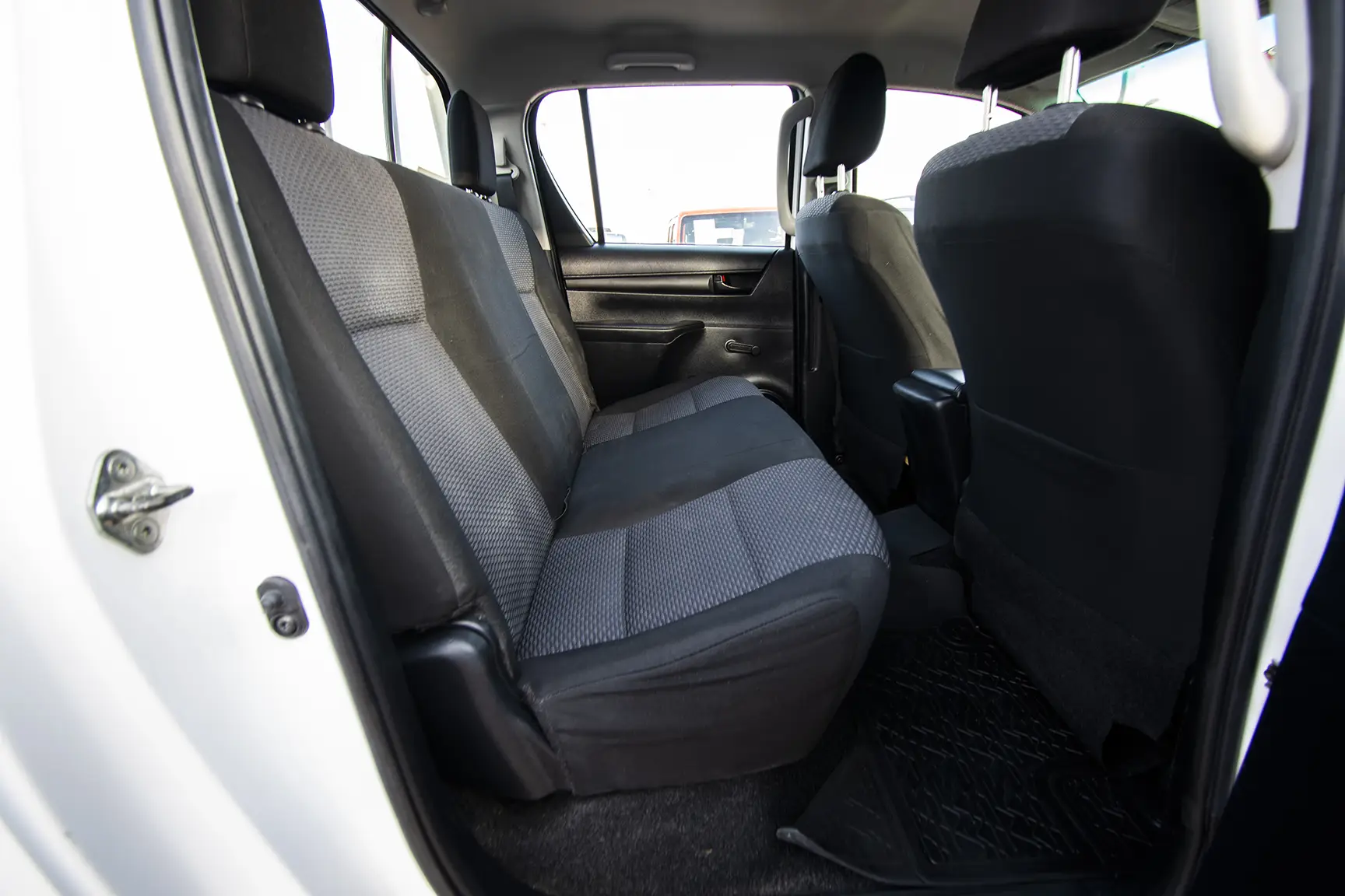 Used 2020 Toyota Hilux GL Double Cabin White – Rear Passenger Side Cabin View at First Choice Cars Sharjah