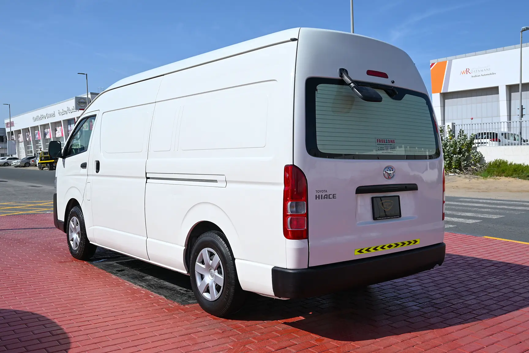 Used 2020 Toyota Hiace GL High Roof White – Left Back Diagonal (45°) View at First Choice Cars Sharjah